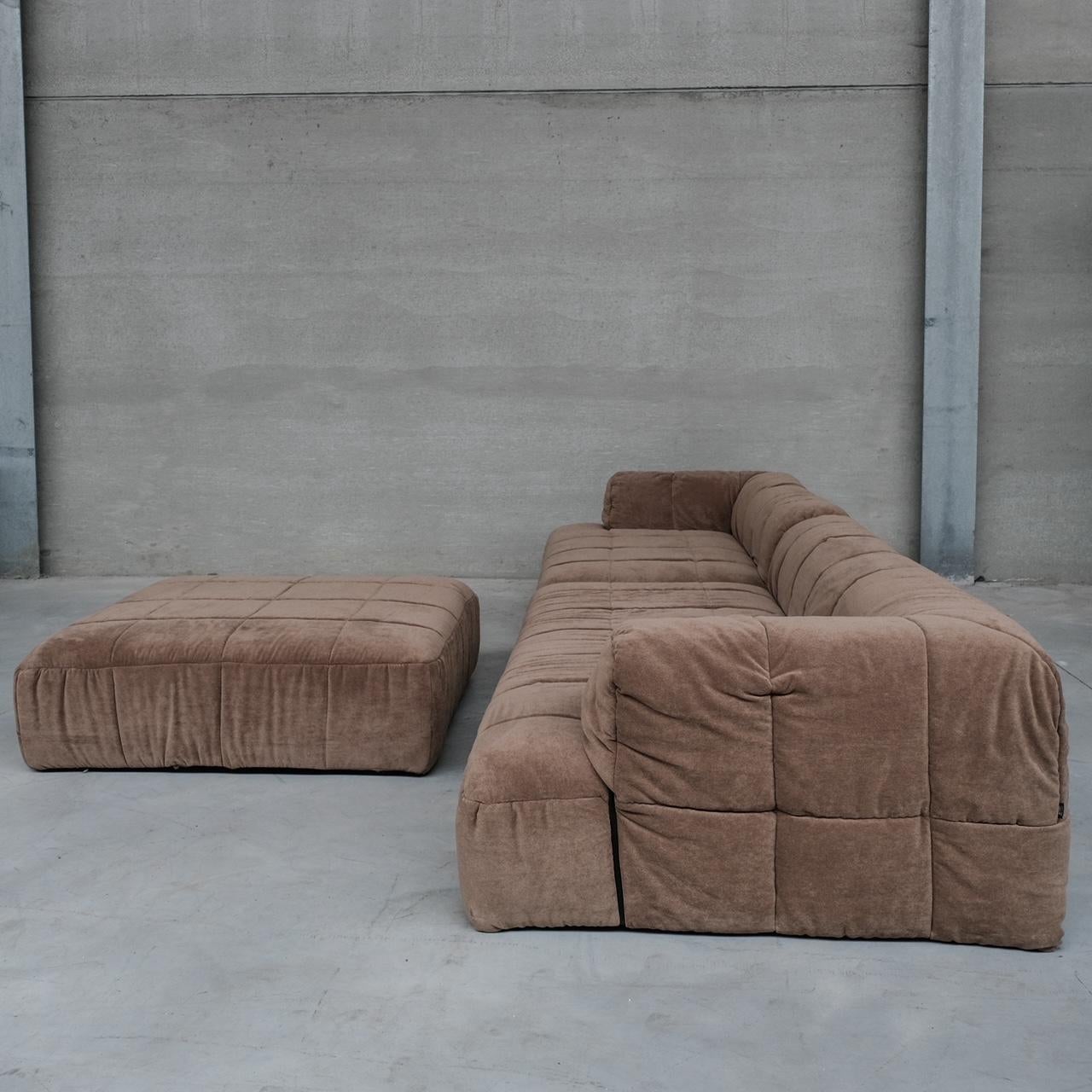 A large modular sofa by Cini Boeri for Arflex. 

Italy, c1970s. 

'Strips' model. 

Two main elements with an ottoman, which can be placed in front or in the middle creating a gap. 

A flexible good looking low slung sofa set in good condition.