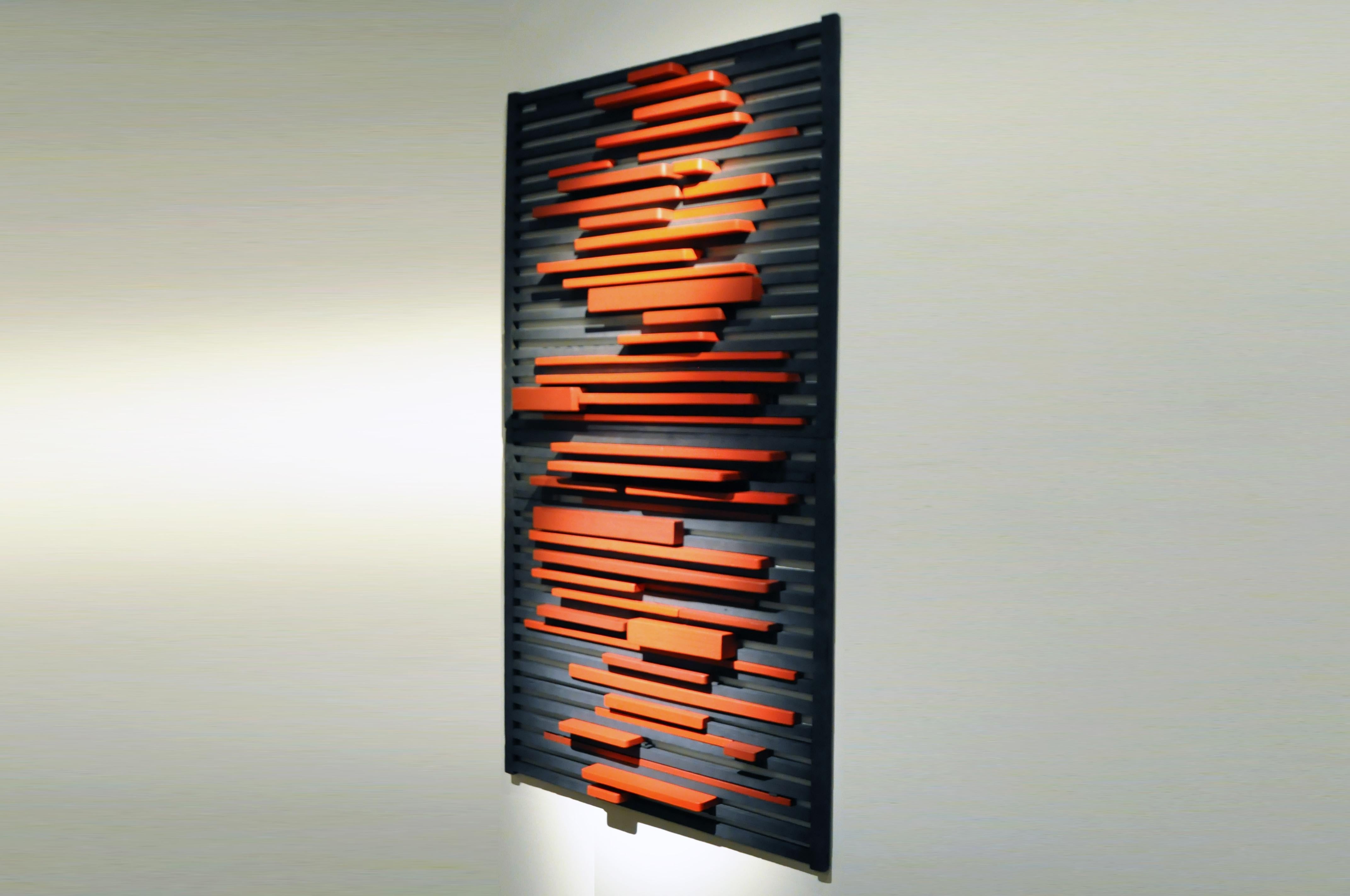 The relationship between color and sound is explored in this wooden construction. As musical sounds are made up of notes, visual compositions are made up of shape, color, texture, and relation to one another. The cinnabar keys are subtly different