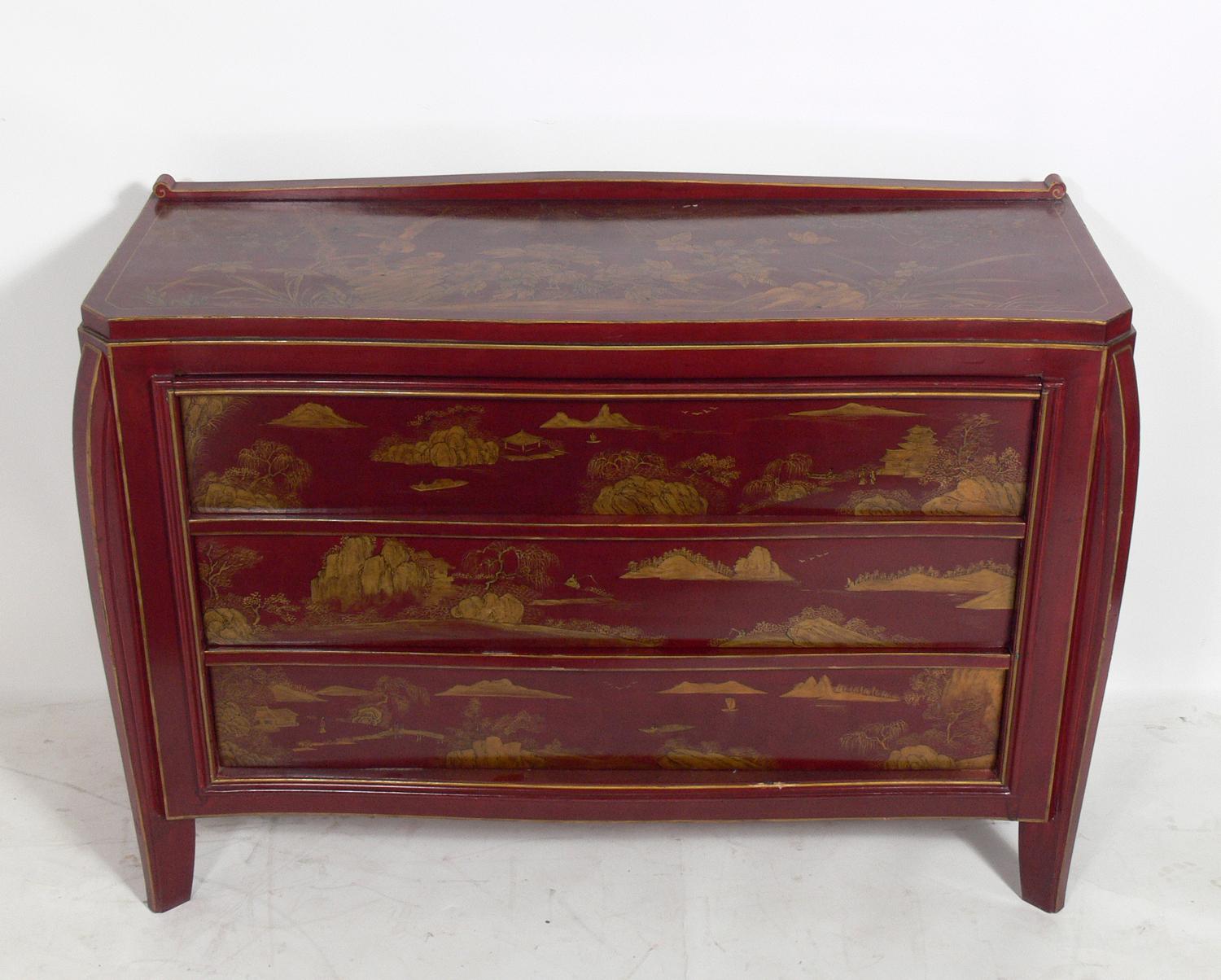 Cinnabar and gold hand painted chinoiserie chest, probably Chinese, circa 1950s or earlier. It is a versatile size and can be used as a chest or dresser in a bedroom, or as a credenza, media cabinet, or bar in a living area.