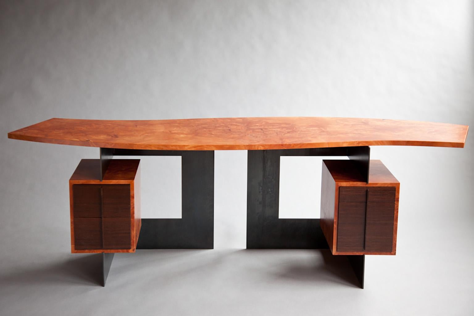 The Cinnamon desk is a hand made modern design by Adam Bentz. Each commission draws on significant craftsmanship & creative energy to achieve an exceptional level of quality & attention to detail. The piece creates a design language which captures