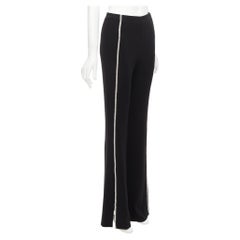 CINQ A SEPT Pantalón negro de talle alto con abertura y cristales transparentes US0 XS
