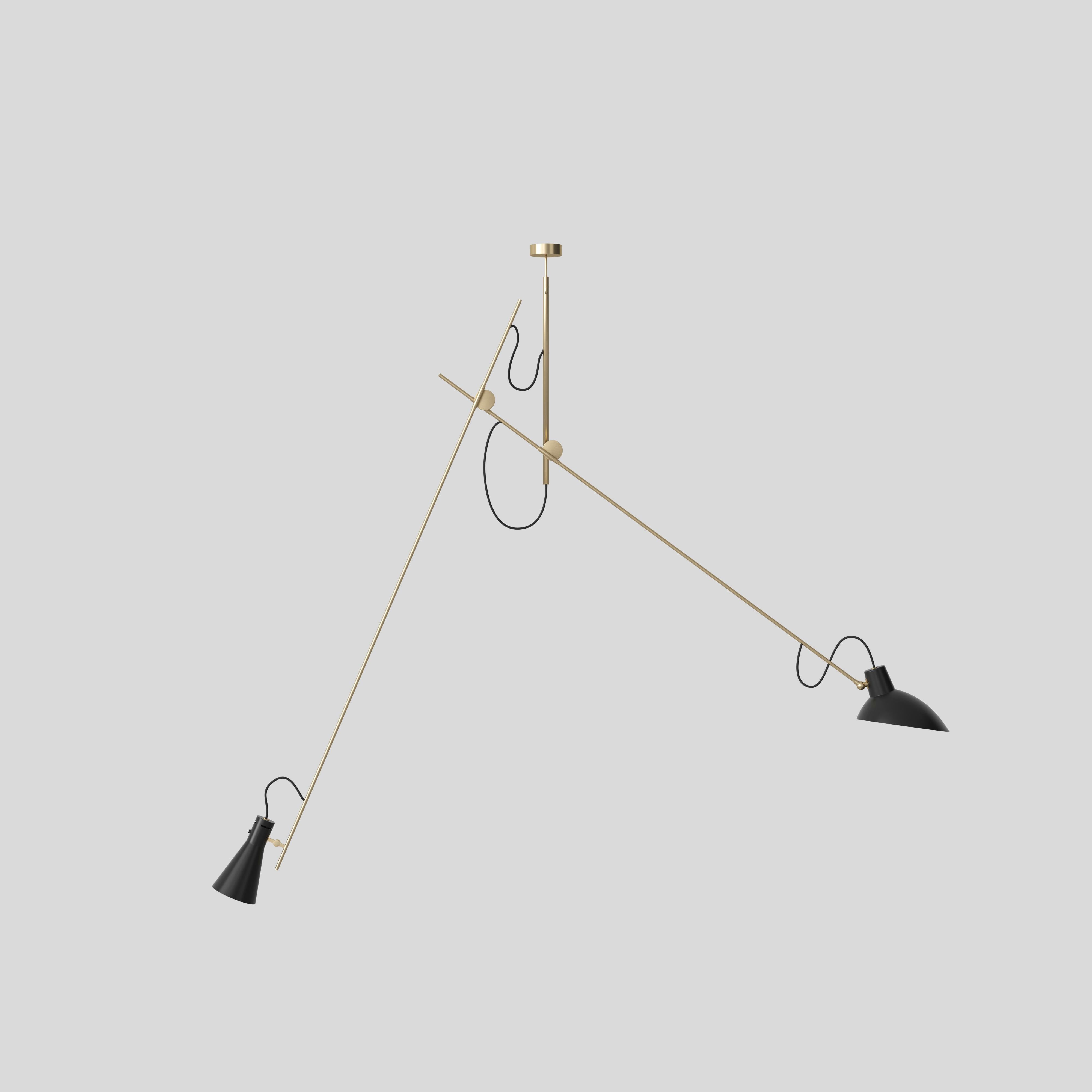 VV Cinquanta suspension lamp
Design by Vittoriano Vigano
This version is with black and white lacquered reflector and brass frame.

The VV Cinquanta Suspension is elegant and versatile with two posable direct light sources.

With a distinctive