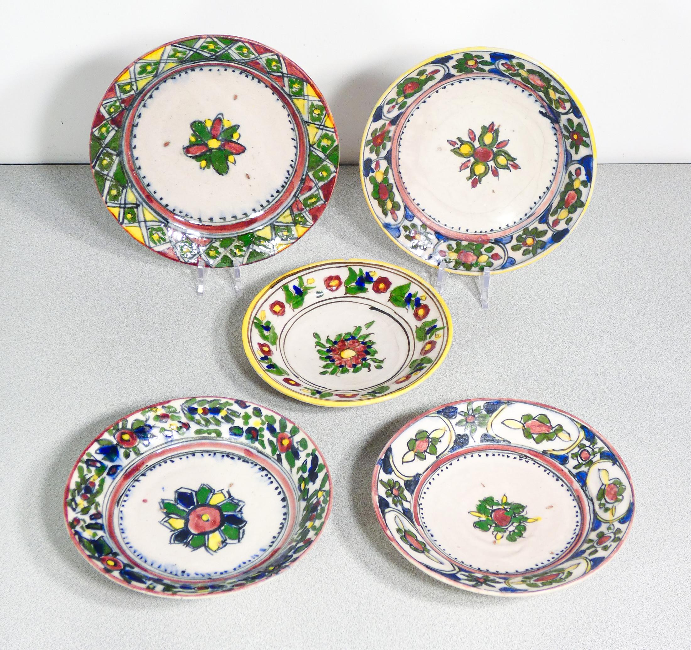 Five dishes
hand-painted majolica
and glazed. Manifattura
central Italy.

ORIGIN
Central Italy

PERIOD
Nineteenth Century

MATERIALS
Hand-painted majolica
and glazed

DIMENSIONS
The plates are handcrafted and have irregular dimensions. We report