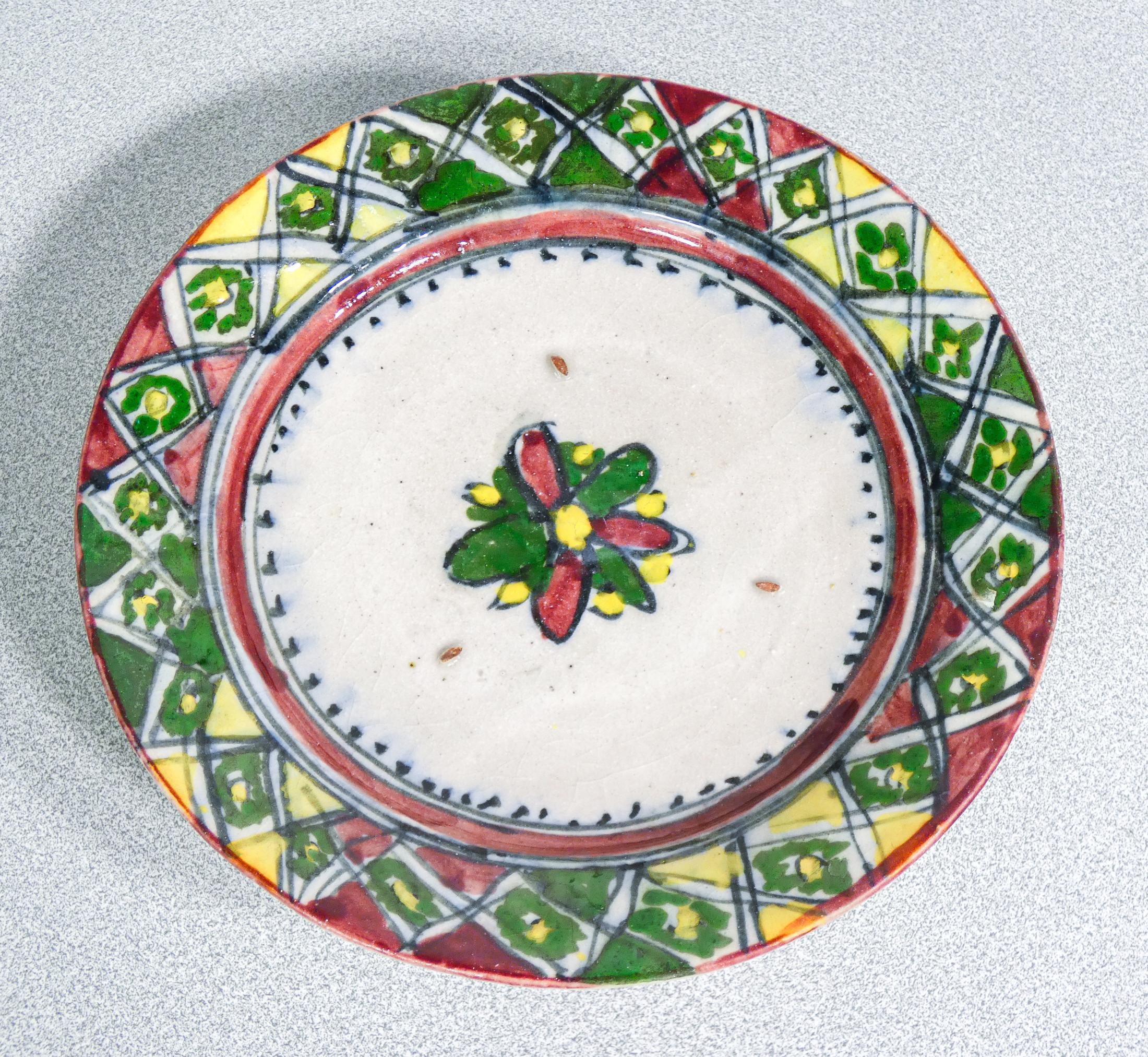 Italian Five hand-painted and glazed majolica dishes. Central Italy. Nineteenth Century For Sale