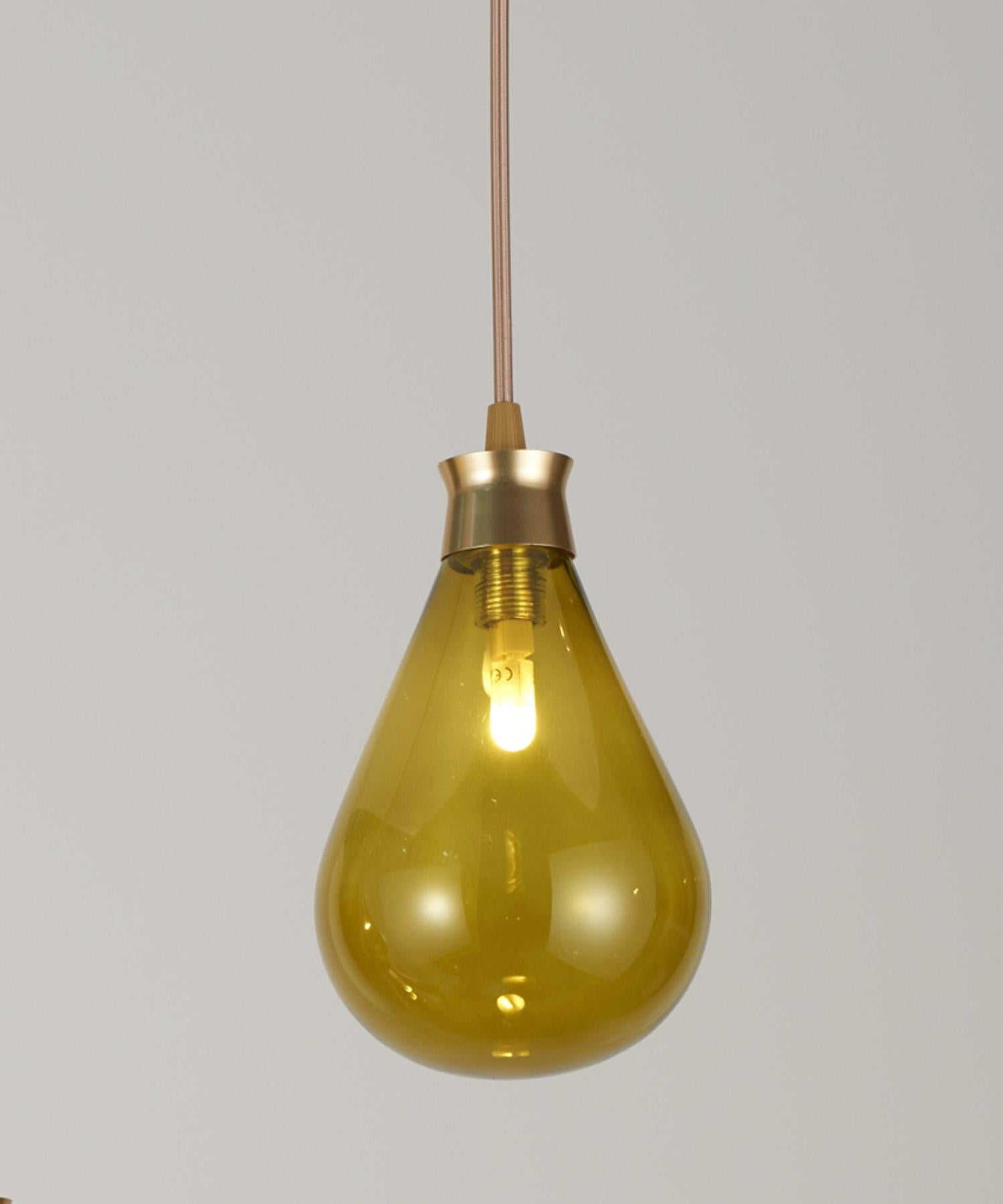 The Cintola Pendant works beautifully as a feature light for kitchens, bedrooms or living spaces. The handblown glass diffusers are available in a range of seven eye-catching colours, whilst the anodised-aluminium body keeps the overall aesthetic
