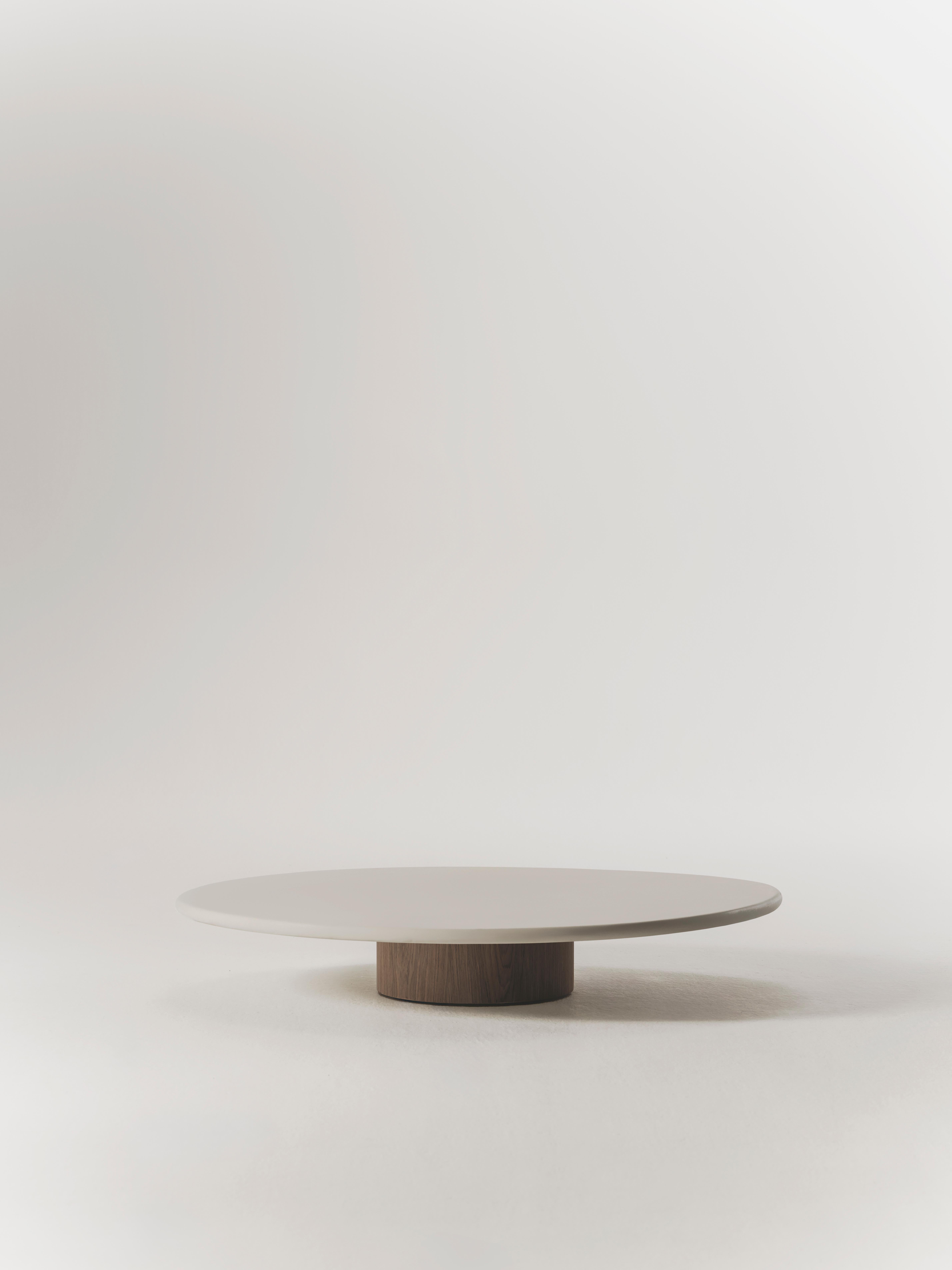 Handcrafted in Spain by expert artisans, this oval-shaped dining table from Marlot Baus combines timeless design with modern craftsmanship. Each piece is carefully made using our signature microcement technique, layered by hand to achieve a smooth,