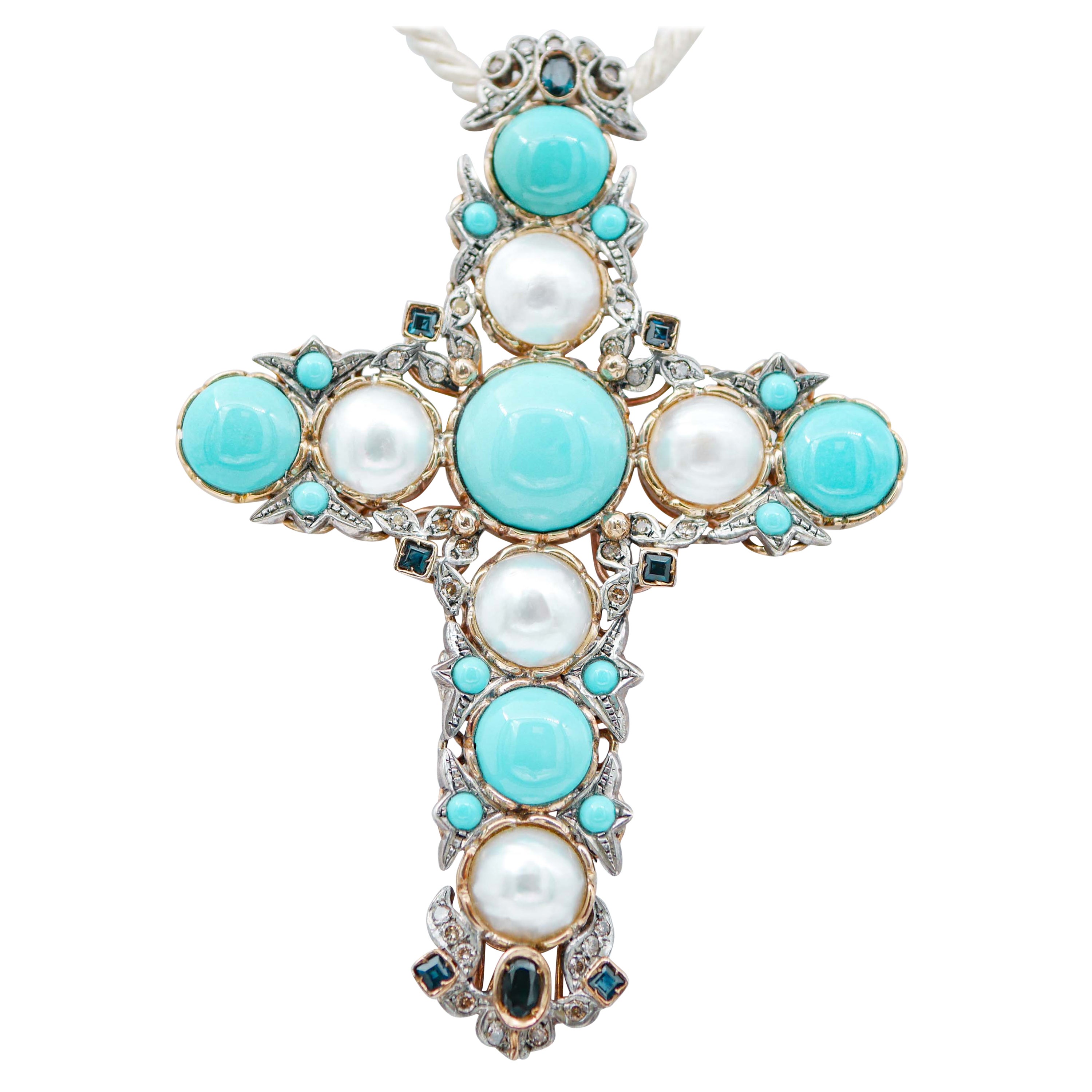 Colgante Cruz de Oro de 14 Kilates y Plata con Diamantes, Zafiros y Turquesa