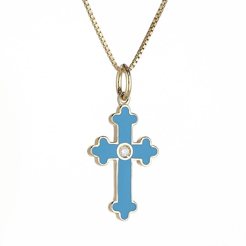 A delicate Latin-shaped cross pendant with a Byzantine-style design.
This cross is embellished with fire enamel work. This glazing technique ensures that the color remains bright and unchanged over time.
It therefore lends itself to being worn every