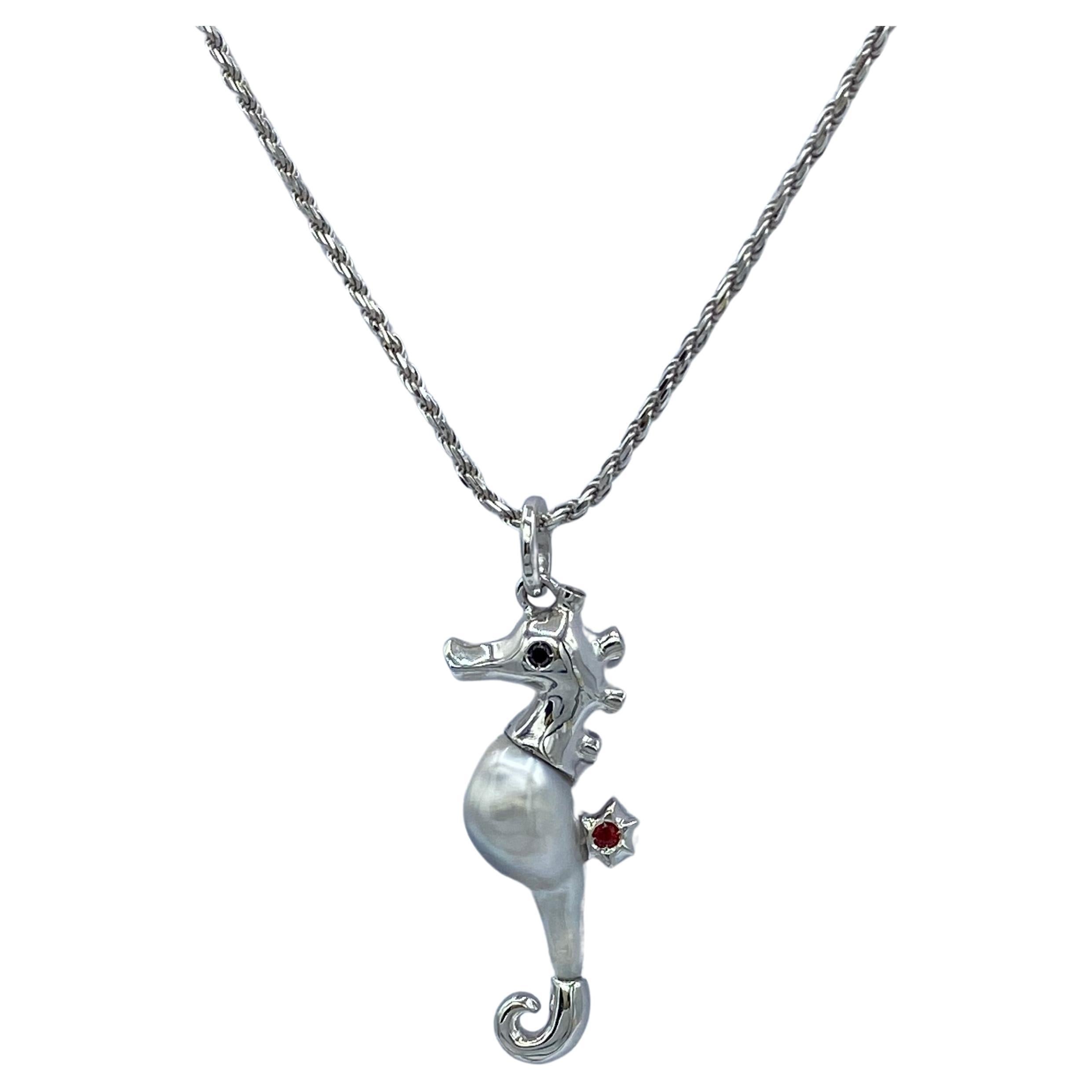 Seahorse pendant in 18Kt gold Keshi pearl diamonds and sapphires For Sale