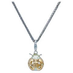 Pendant/Charm Ladybug good luck charm in 18Kt gold and pearl  of the South Seas
