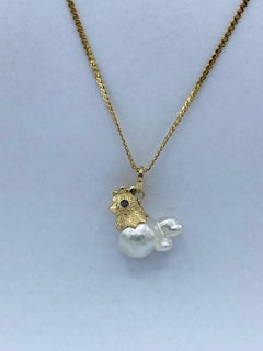 18Kt Gold Hen Pendant/Charm with Australian Pearl and Black Diamonds