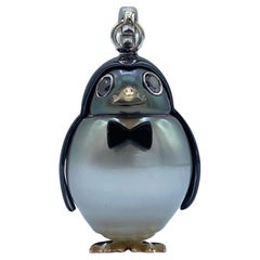 18Kt gold penguin pendant/charm with black diamond Tahiti pearl