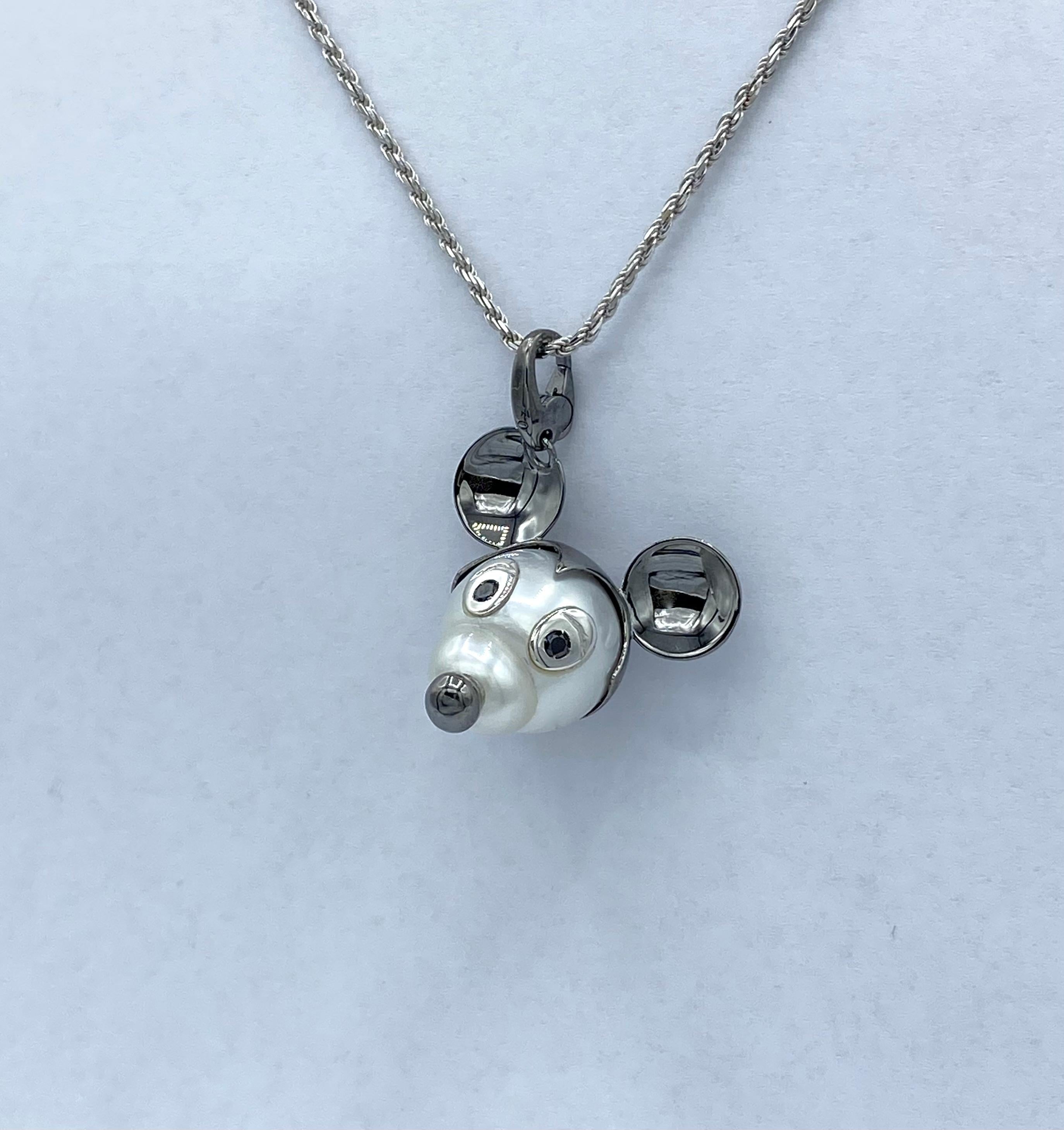 Artisan Mickey Mouse pendant/ Charm in 18Kt gold black diamonds and Australian pearl For Sale