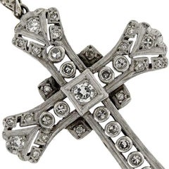 Pendentif croix en or blanc avec diamants