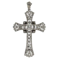 Ciondolo croce in oro bianco con diamanti