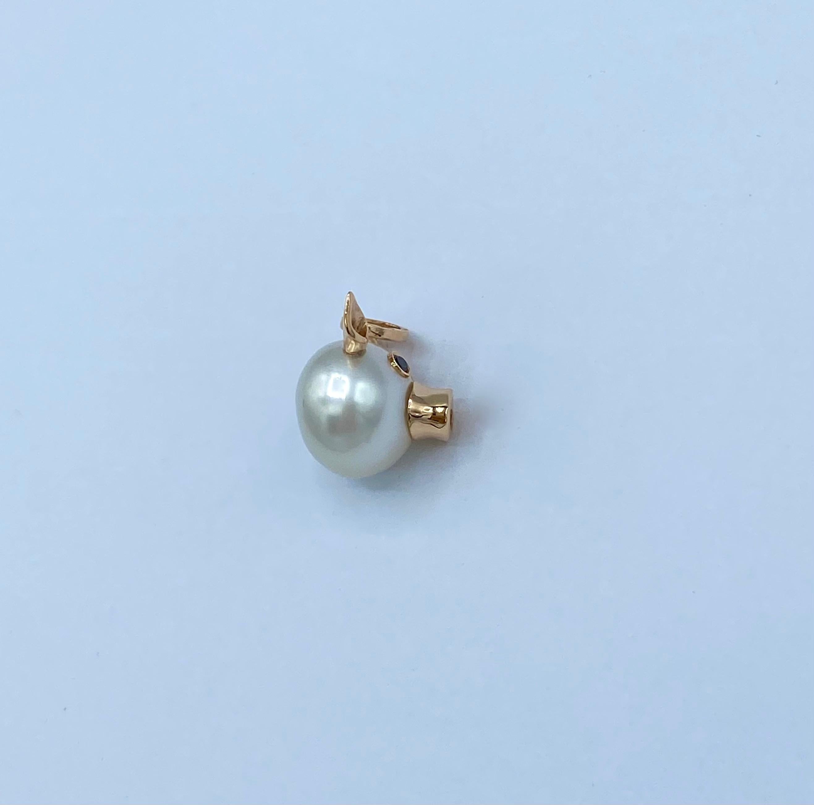 Women's or Men's 18KT rose gold piglet pendant with Australian pearl, diamonds and sapphires For Sale