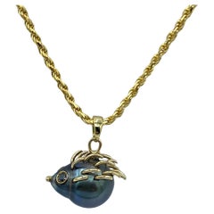 Porcupine pendant in 18Kt yellow gold tahiti pearl black diamonds
