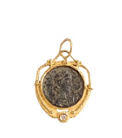Ciondolo Moneta di Sacchi realizzato in Oro 18 K con Diamante
