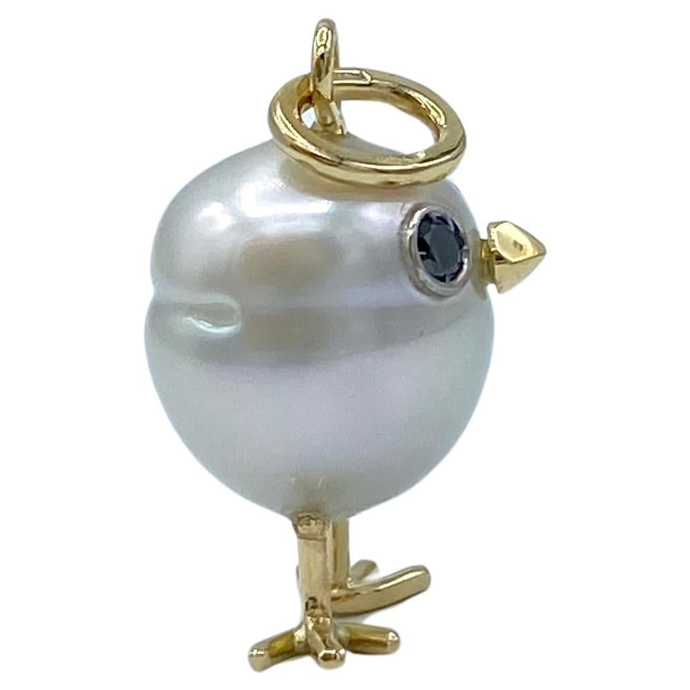 Artisan 18Kt gold chick pendant with Australian pearl and black diamonds