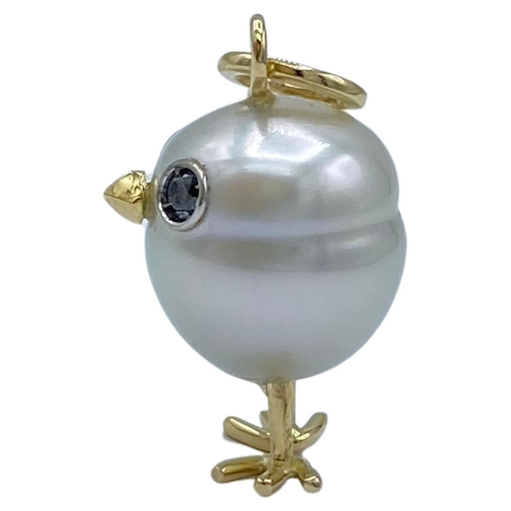 Round Cut 18Kt gold chick pendant with Australian pearl and black diamonds