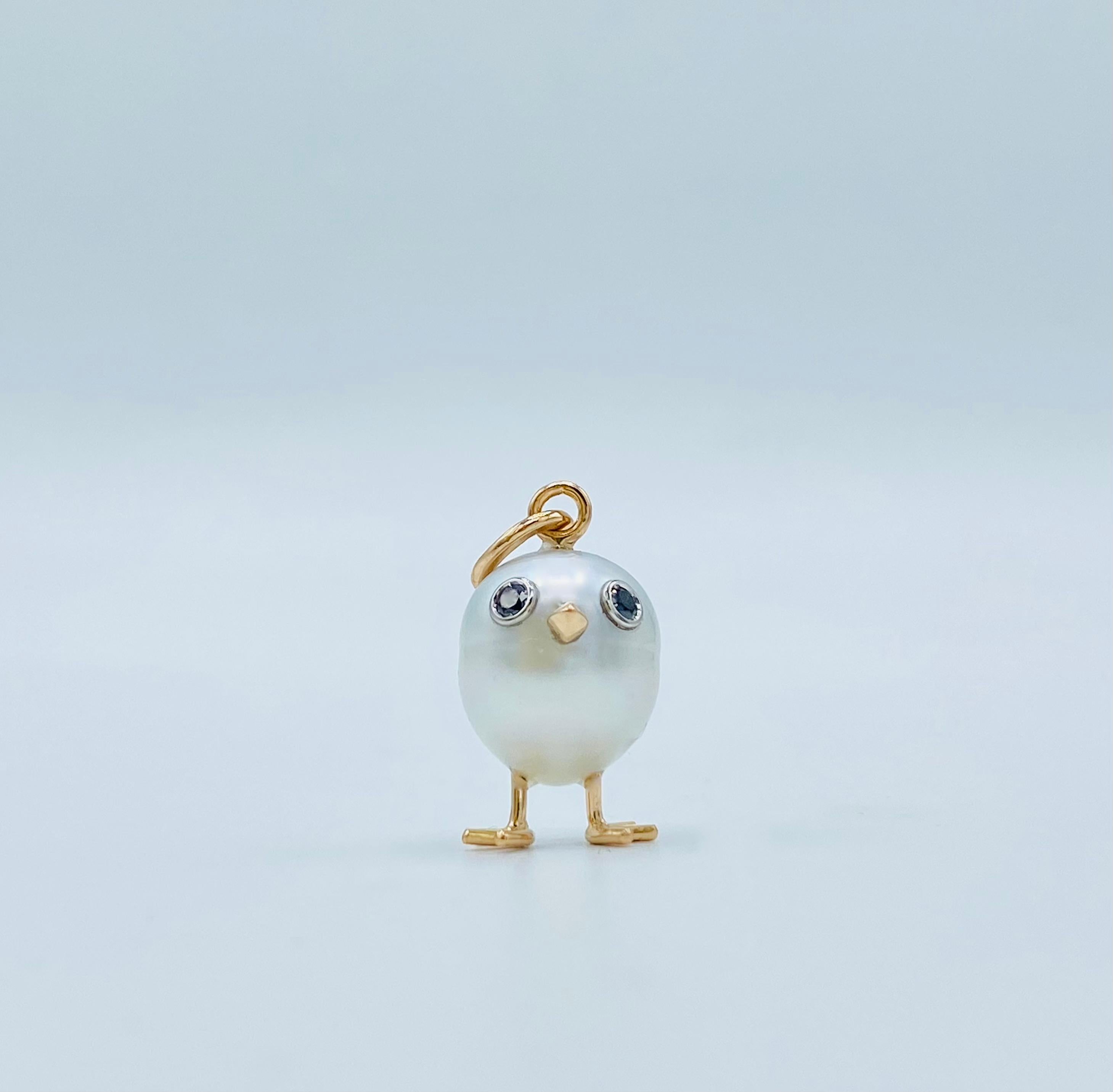 Women's 18Kt gold chick pendant with Australian pearl and black diamonds