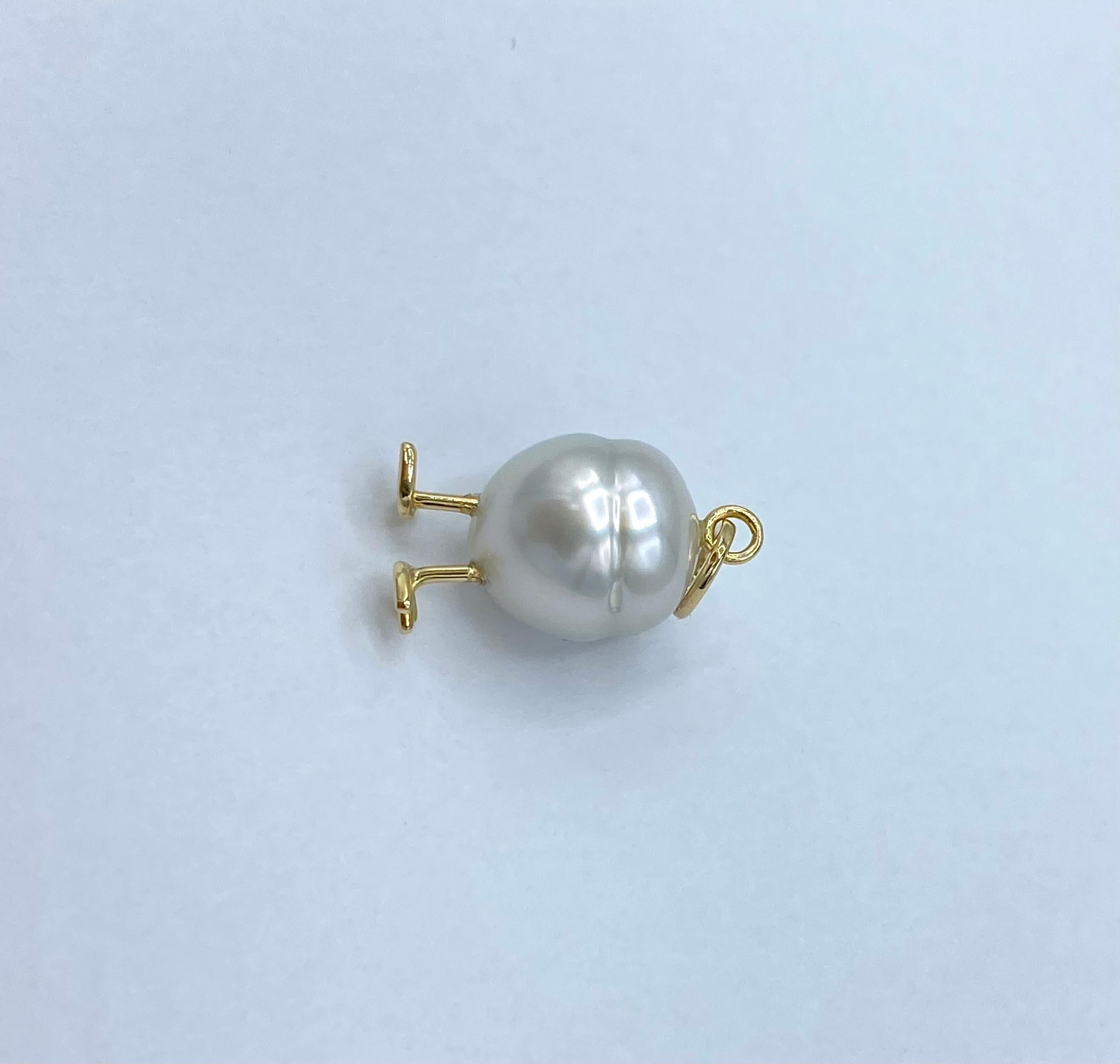18Kt gold chick pendant with Australian pearl and black diamonds 2