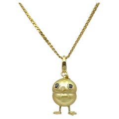 18Kt gold chick pendant with South Sea pearl and diamonds
