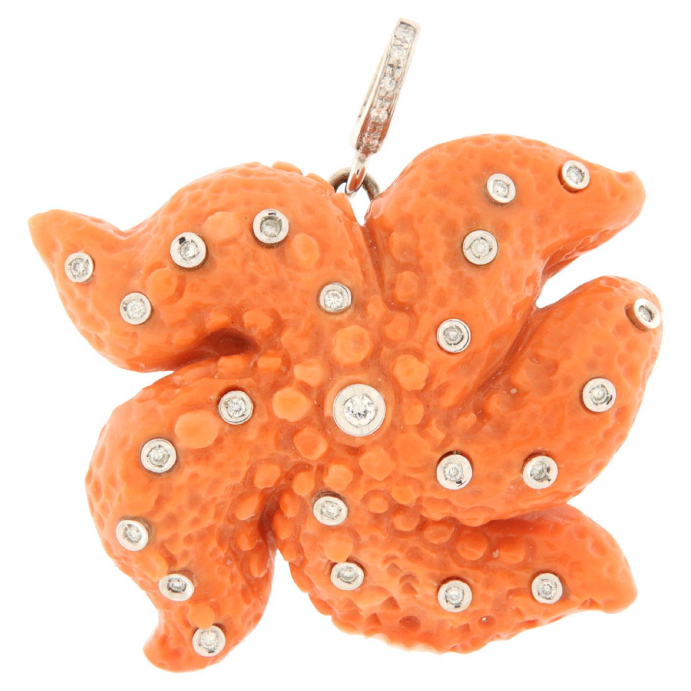 Orange coral starfish pendant, white gold and diamonds