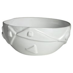 white ceramic bowl with embossed triangle decoration