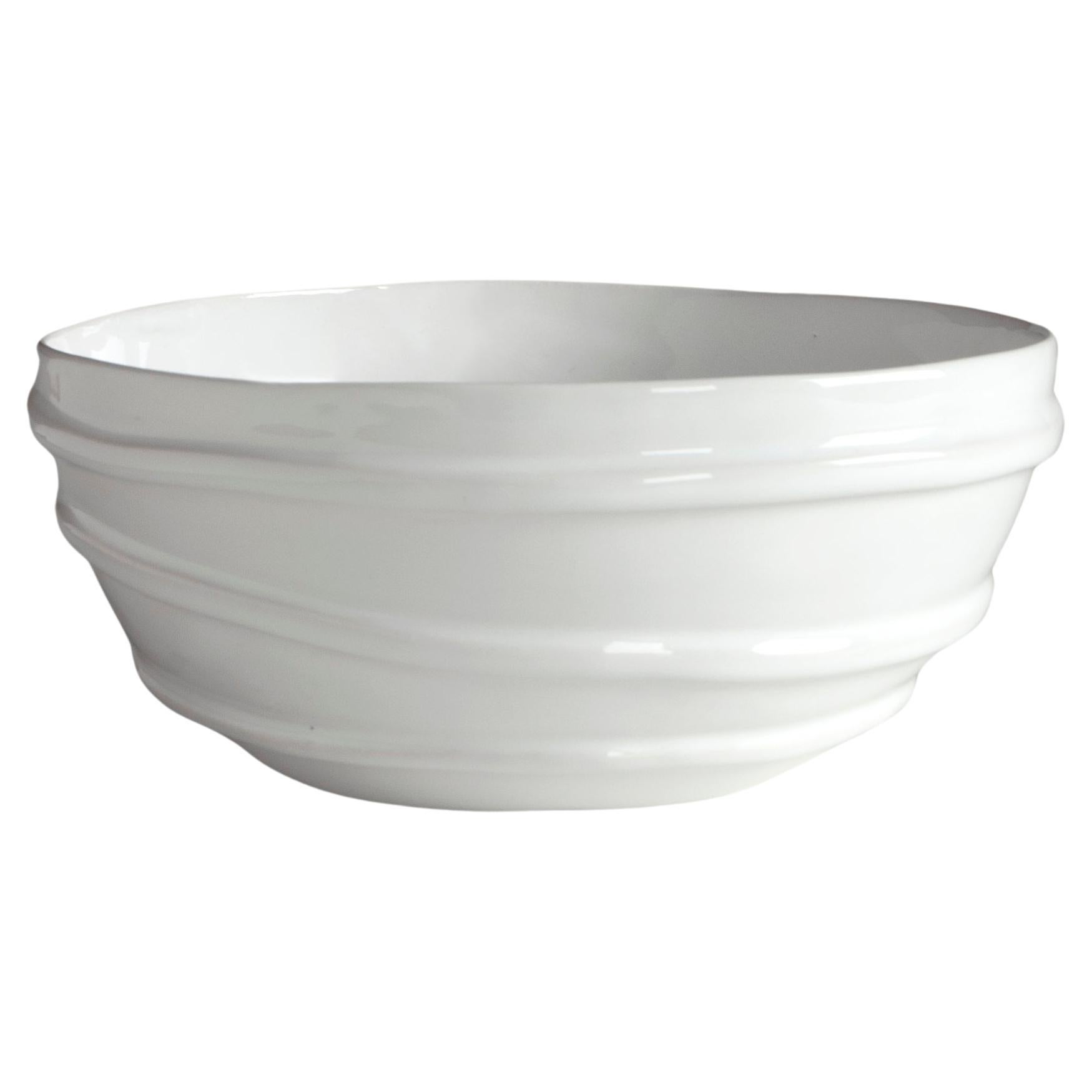 white ceramic bowl decorated with three lines in relief For Sale