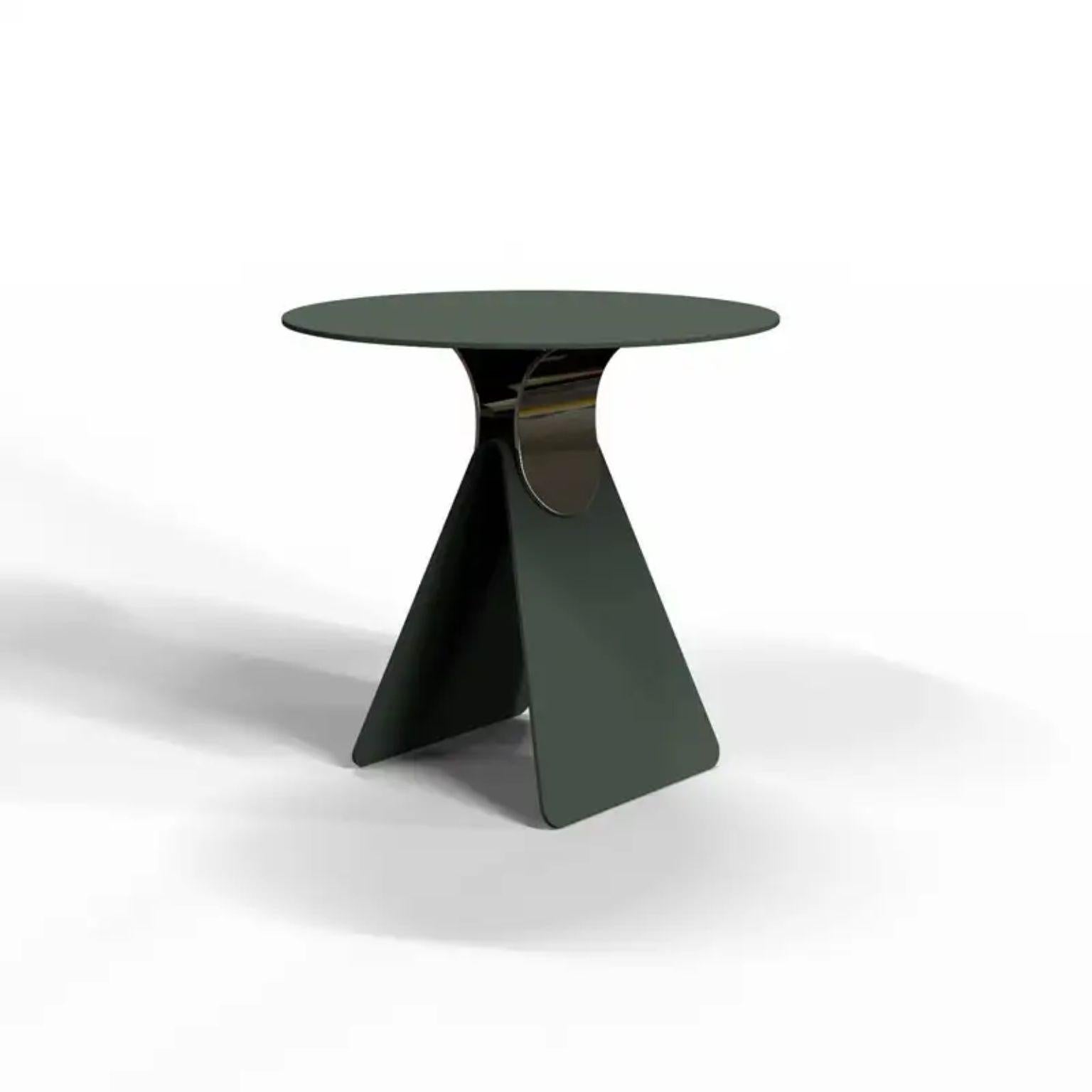 Cipputi dark green coffee table by Mason Editions
Designed by Quaglio Simonelli.
Dimensions: Ø 50 cm x H 48 cm.
Materials: metal.

Available in different colors. 

Cipputi is a side table designed by metal sheets that fold and assemble to