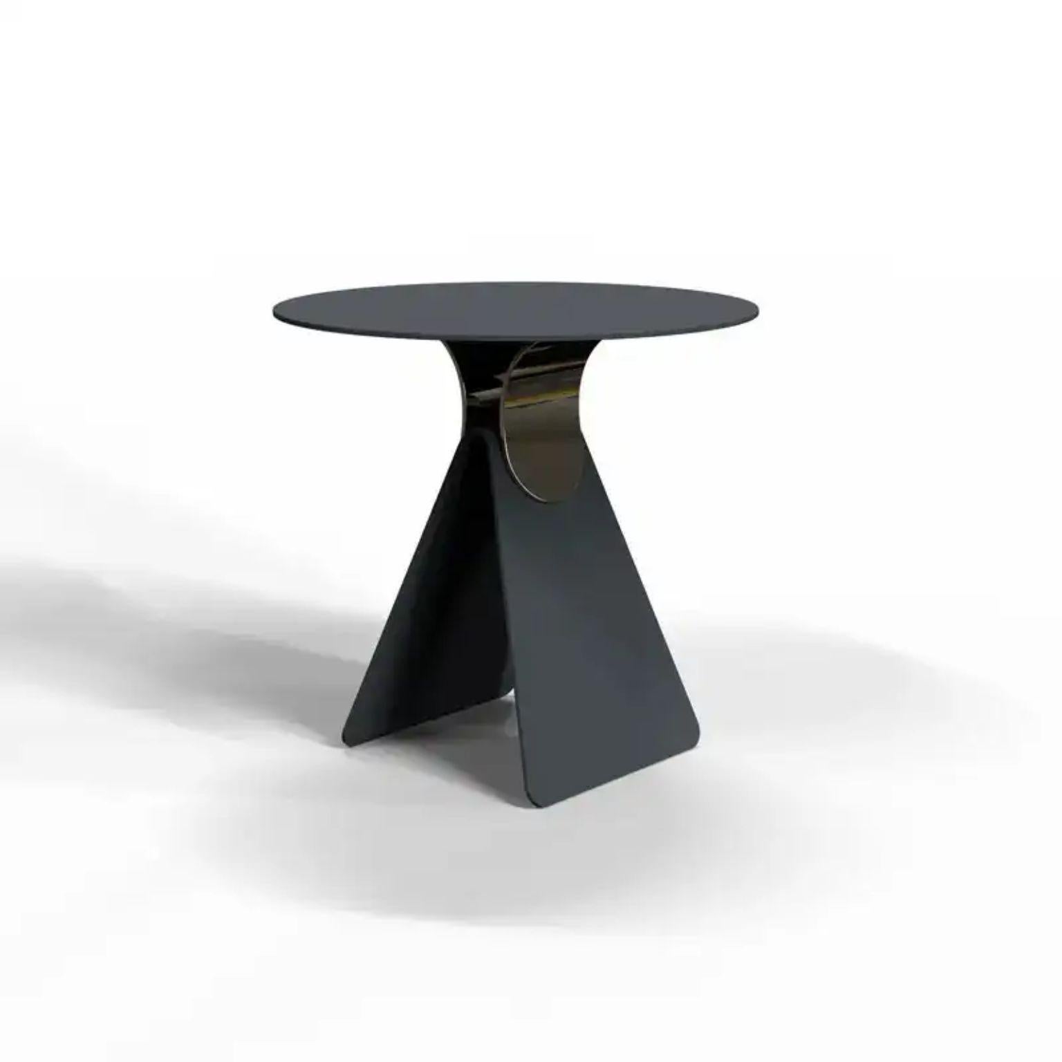 Cipputi midnight blue coffee table by Mason Editions.
Designed by Quaglio Simonelli.
Dimensions: Ø 50 cm x H 48 cm.
Materials: Metal.

Available in different colors.
Cipputi is a side table designed by metal sheets that fold and assemble to