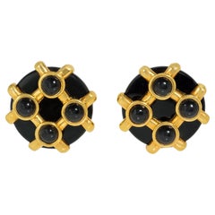 Pendientes en forma de disco de ónice y oro Cipullo para Cartier.