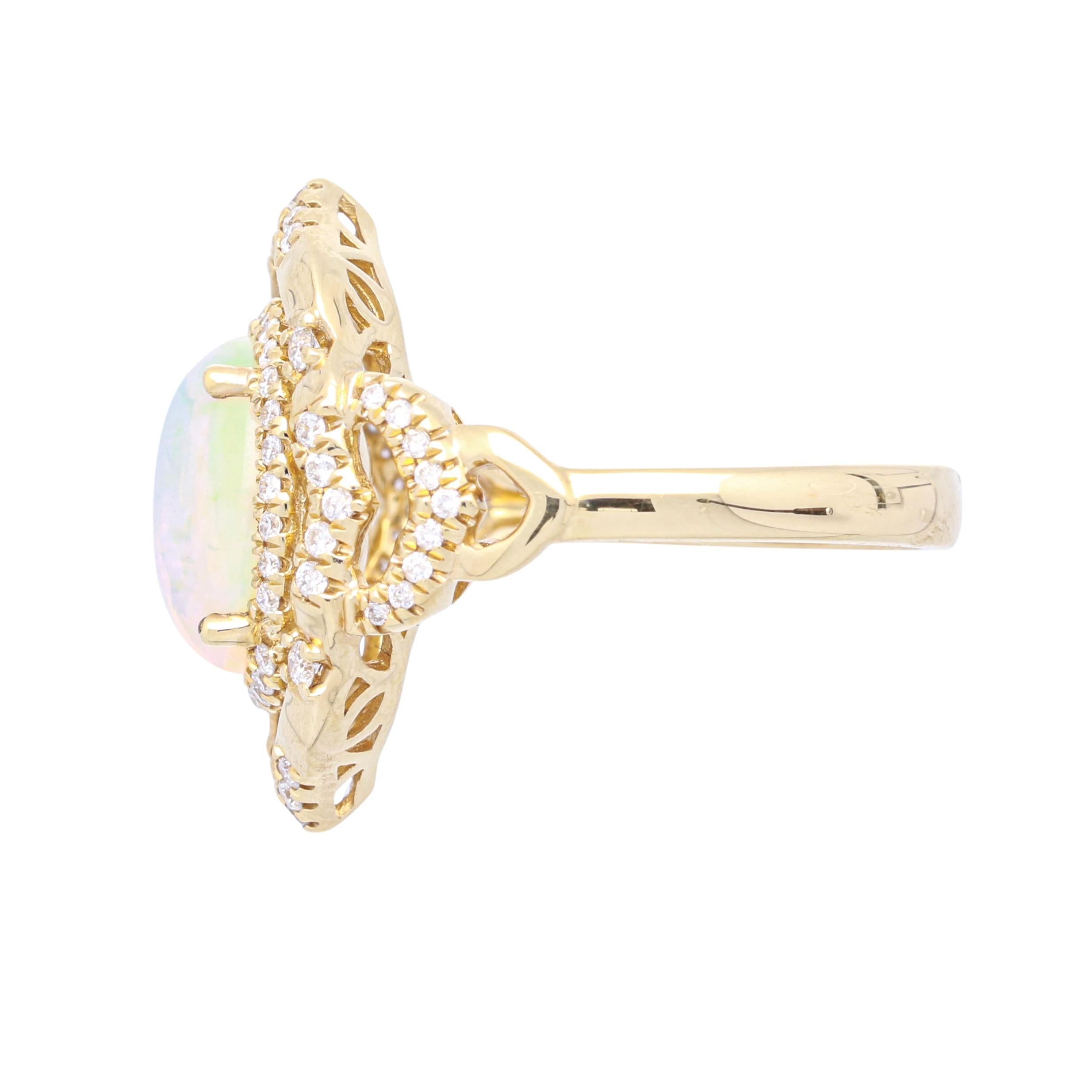 This one of a kind ring is crafted in 14-karat Yellow gold and features an oval cut 2 1/3 carat Ethiopian Opal & 72 Round Diamond  2/5 Ct in a prong-setting. This ring comes in size 7 and it is a perfect gift either for yourself or someone you love.