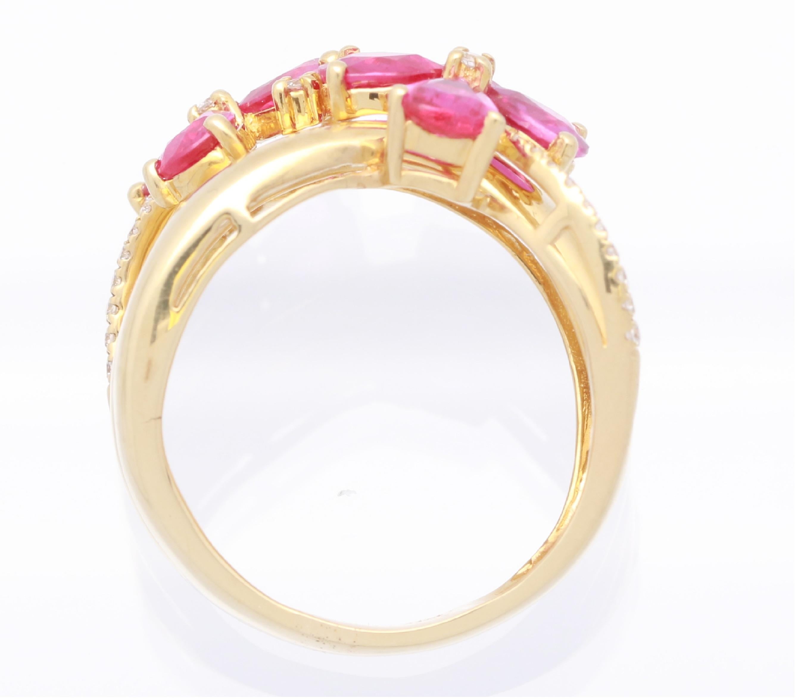 This one of a kind floral cocktail Ring is crafted in 18-karat Yellow gold and features 7 Rubies with 2 1/3 carats & 23 Round Diamonds 1/9 Ct. in a prong-setting. This ring comes in Size 7 is a perfect gift either for yourself or someone you love.