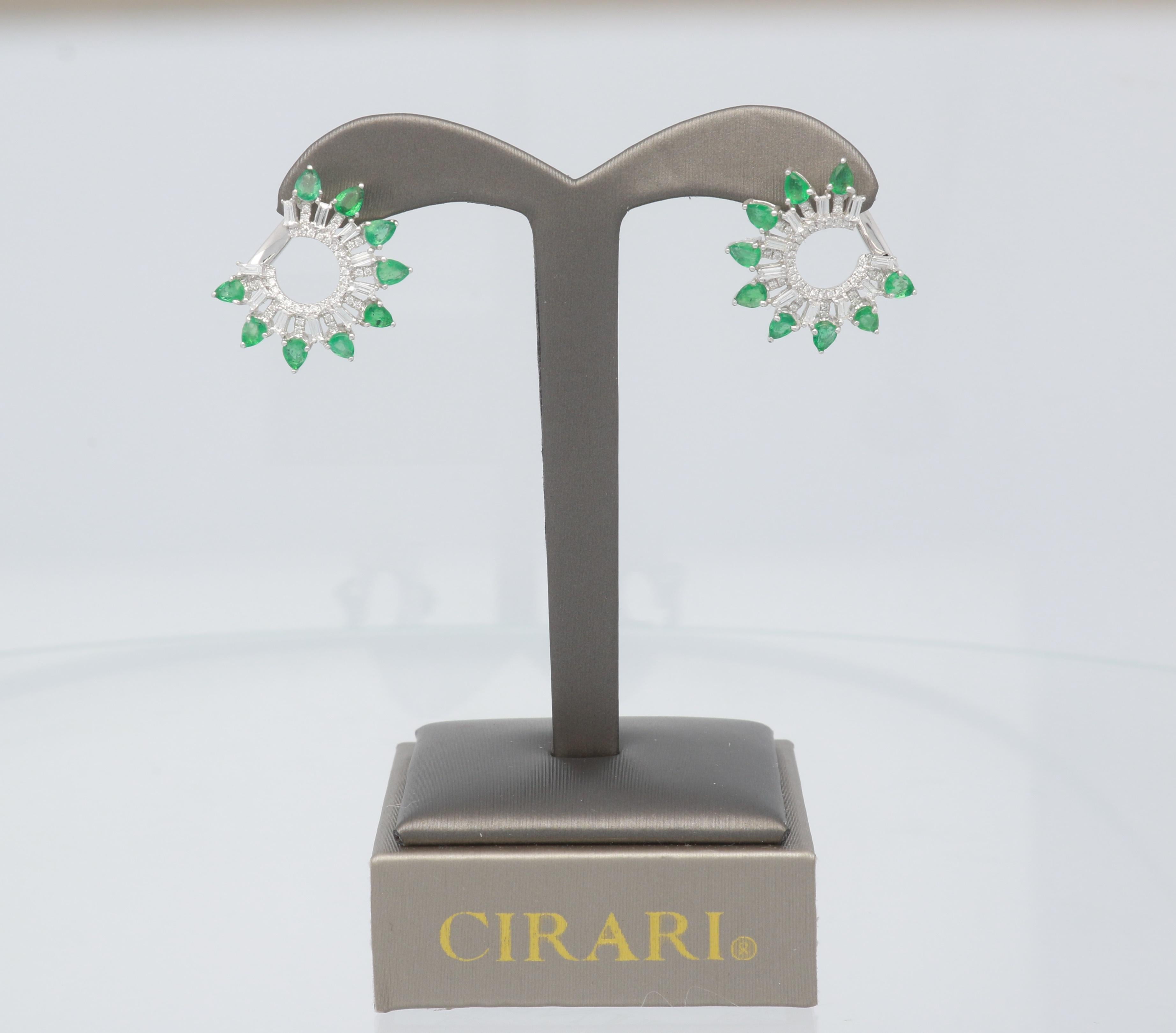 This one of a kind Earring is crafted in 18-karat White Gold and features a 18 Emerald 2.59 Carat, 20 Baguette Diamond 0.58 Carat & 80 Brilliant cut Round Diamonds 0.30 Carat. This Earring is a perfect gift either for yourself or someone you love.