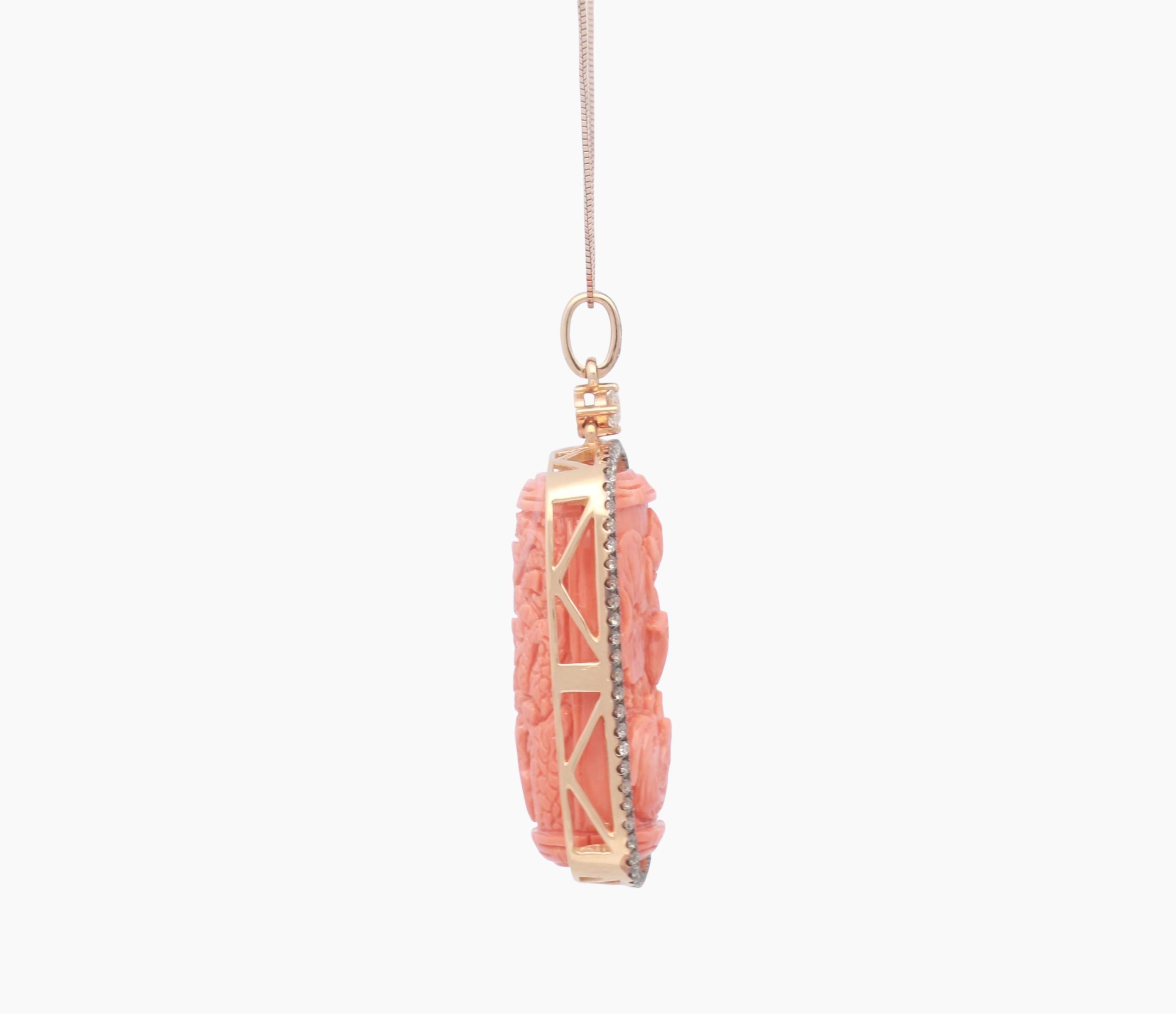 This pendant is carved with unique design and is crafted in 18-karat Rose Gold. It features a Coral 45.92 carat, 1 Round Diamond 1/9 Carat & 73 Brown Diamonds 2/3 carat. This Pendant comes with 18