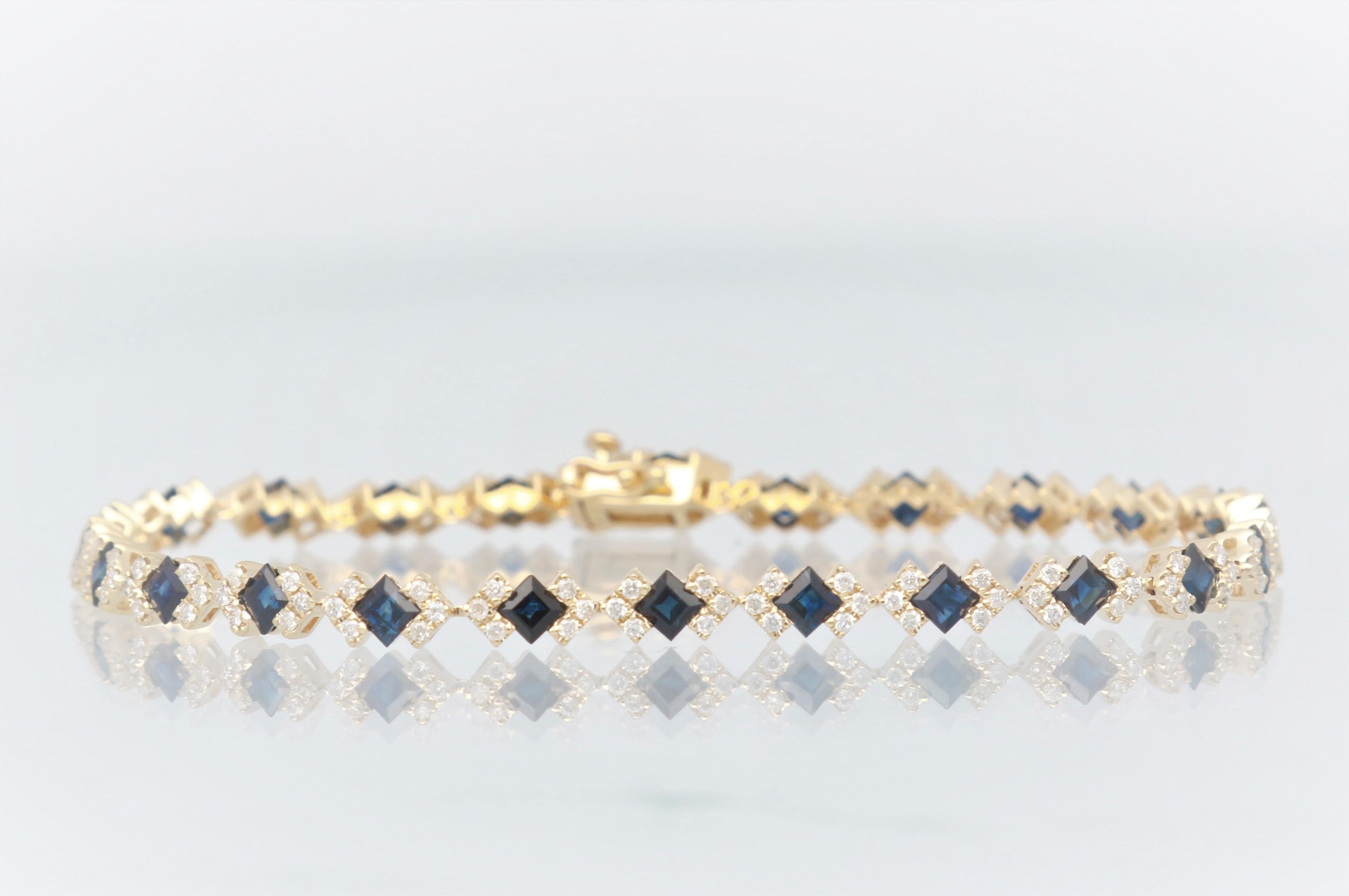 This beautiful bracelet is crafted in 14-karat Yellow Gold and features 24 Square Princess-cut Blue Sapphires 4.70 Carat & 144 Round Brilliant cut Diamonds 1 Carat. This Bracelet comes in our beautiful gift box and is a perfect gift for yourself or