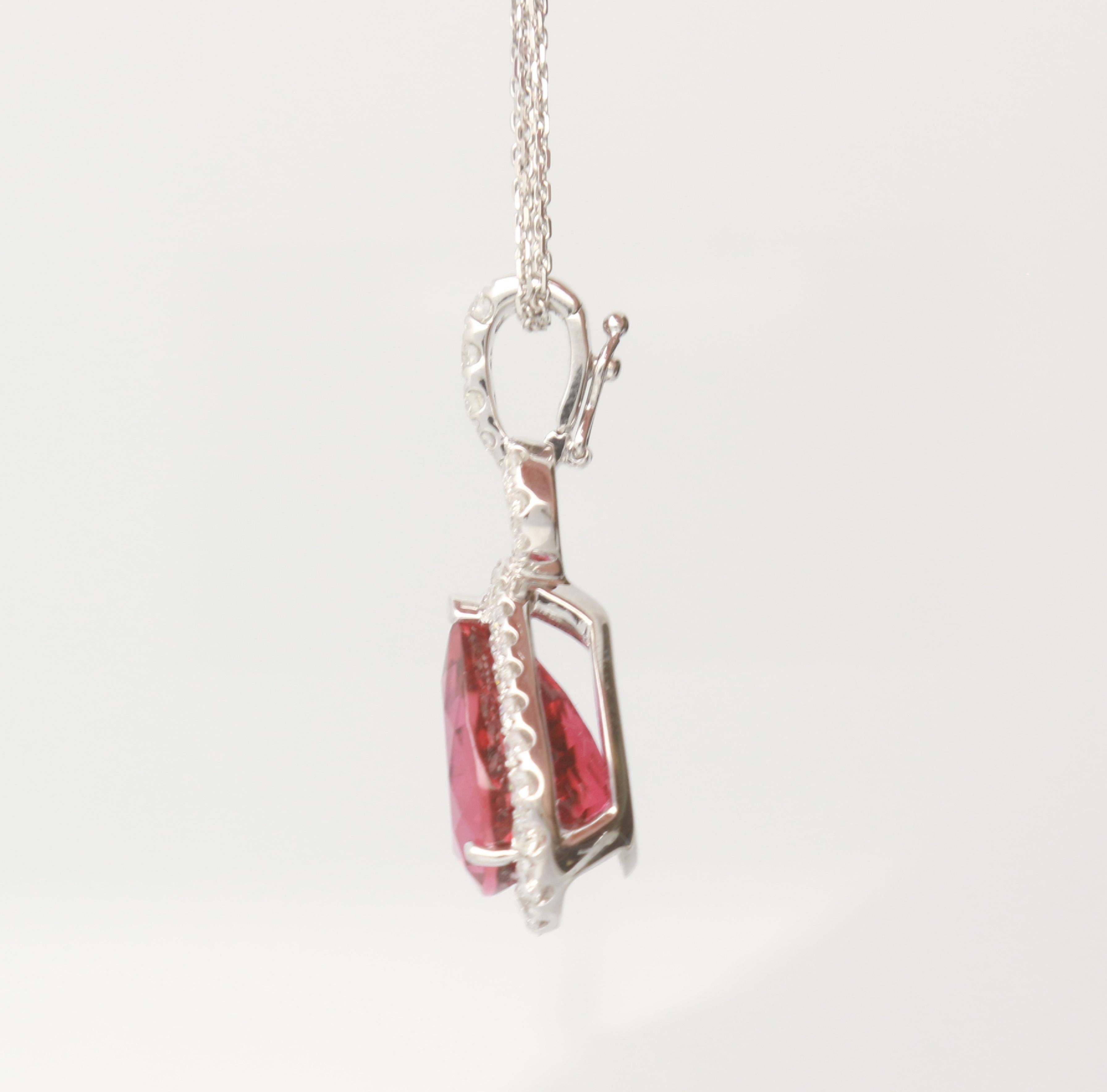 This one of a kind Pendant is crafted in 18-karat White Gold and features a pear shaped Rubellite 7.37 carat & 39 Round Diamond 1.13 carat. This pendant comes with double cable chain, and secured with lobster Clasp. This Pendant is a perfect gift