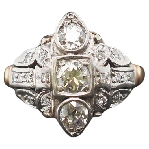 Circa 14K Yellow Gold and Plat 1940s Old European Diamond Ring