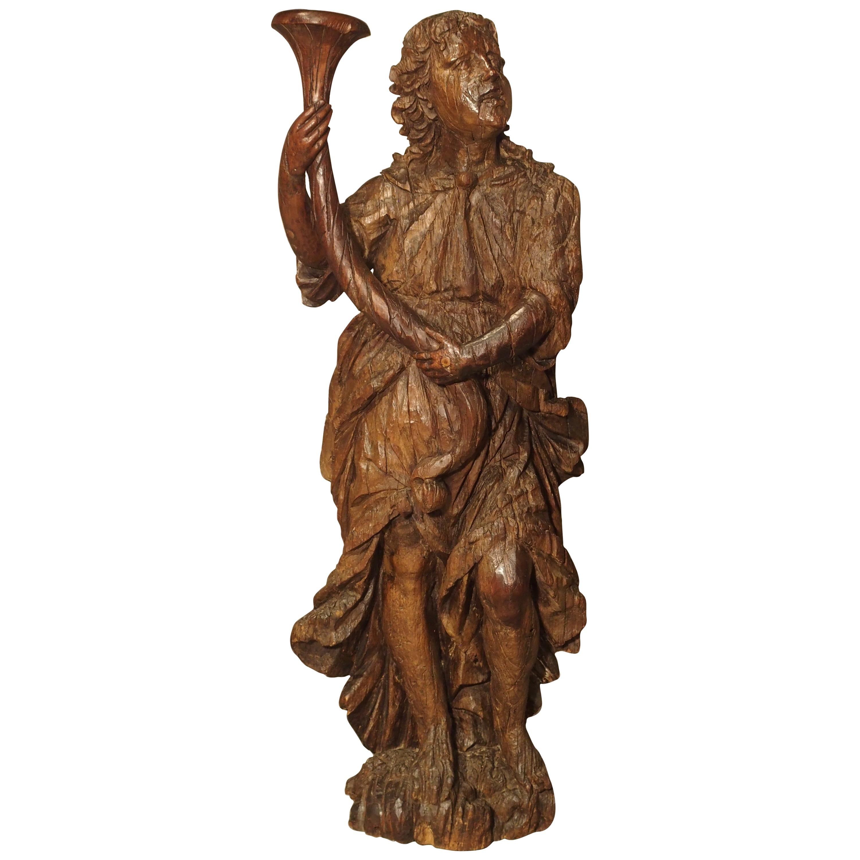 Circa 1650 Carved Hardwood Cornucopia Statue and Candle Holder from Italy For Sale