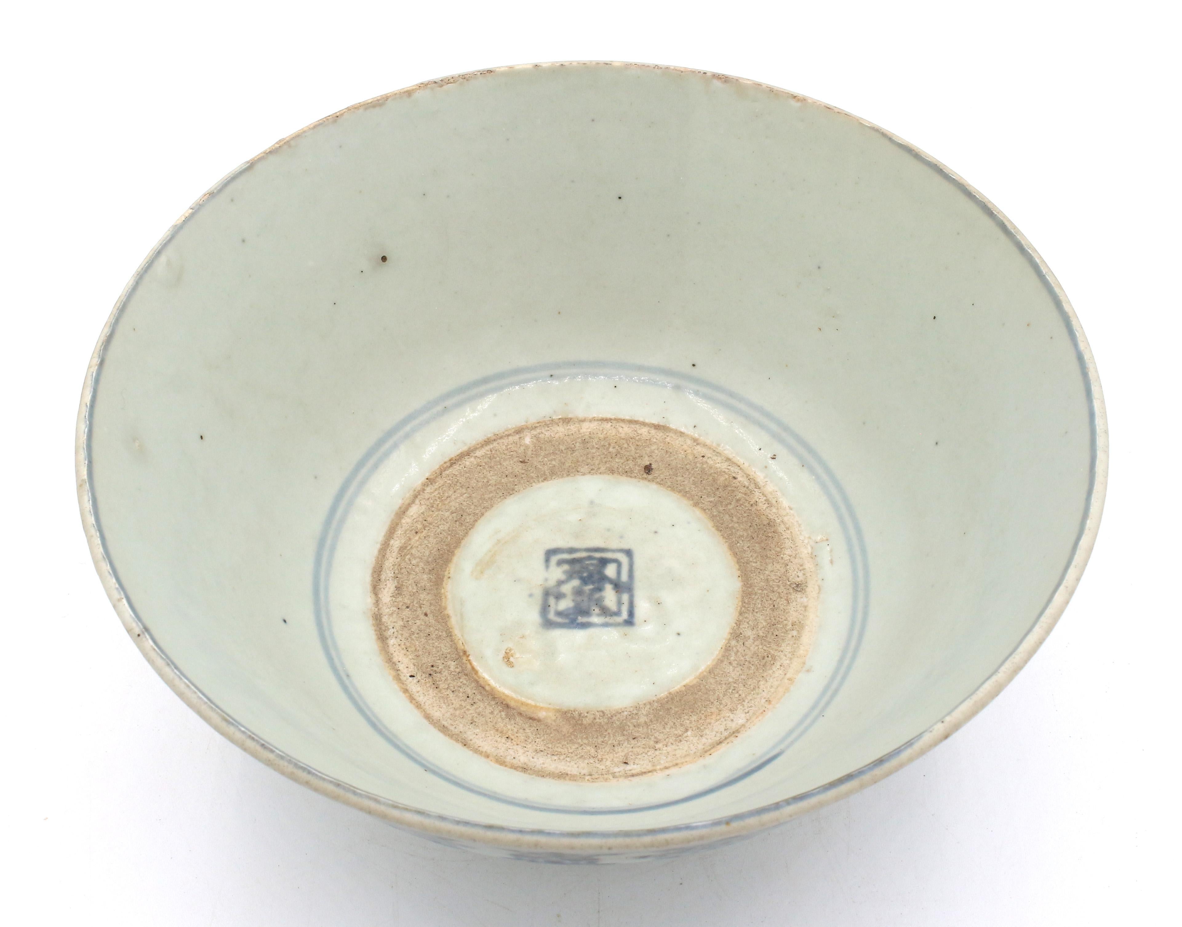 Circa 1680 porcelain family rice bowl, Chinese export to SE Asia. Early Qing Dynasty. Underglaze blue esoteric Buddhist symbol (Vajrayana, Mantroyana, etc.) traditions. Symbols is Sanskrit. Some rim fritting & other use signed over the last 350