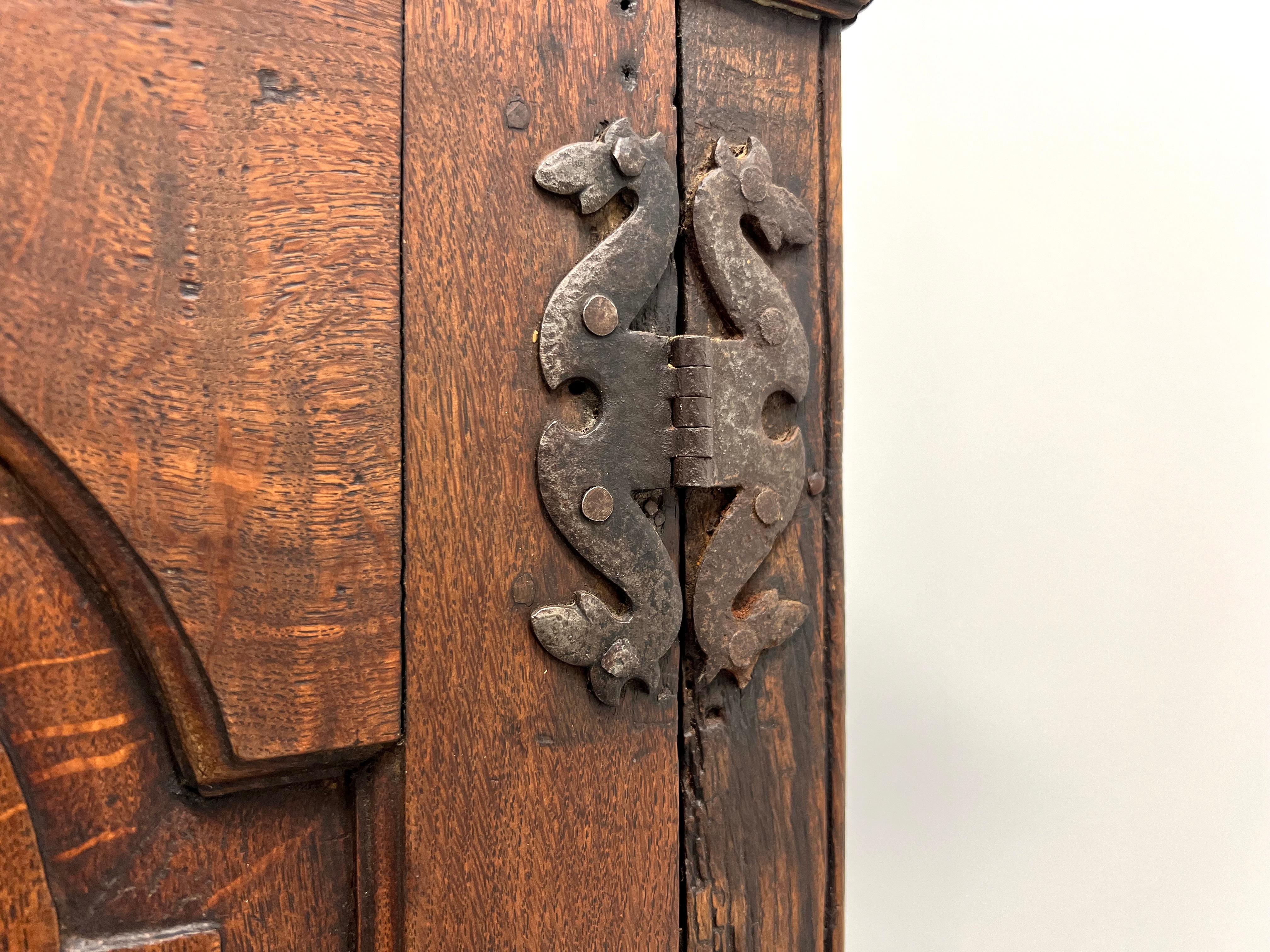 Brass Circa 1700 Quartersawn Oak English Hanging Cupboard with Tombstone Panel Door For Sale