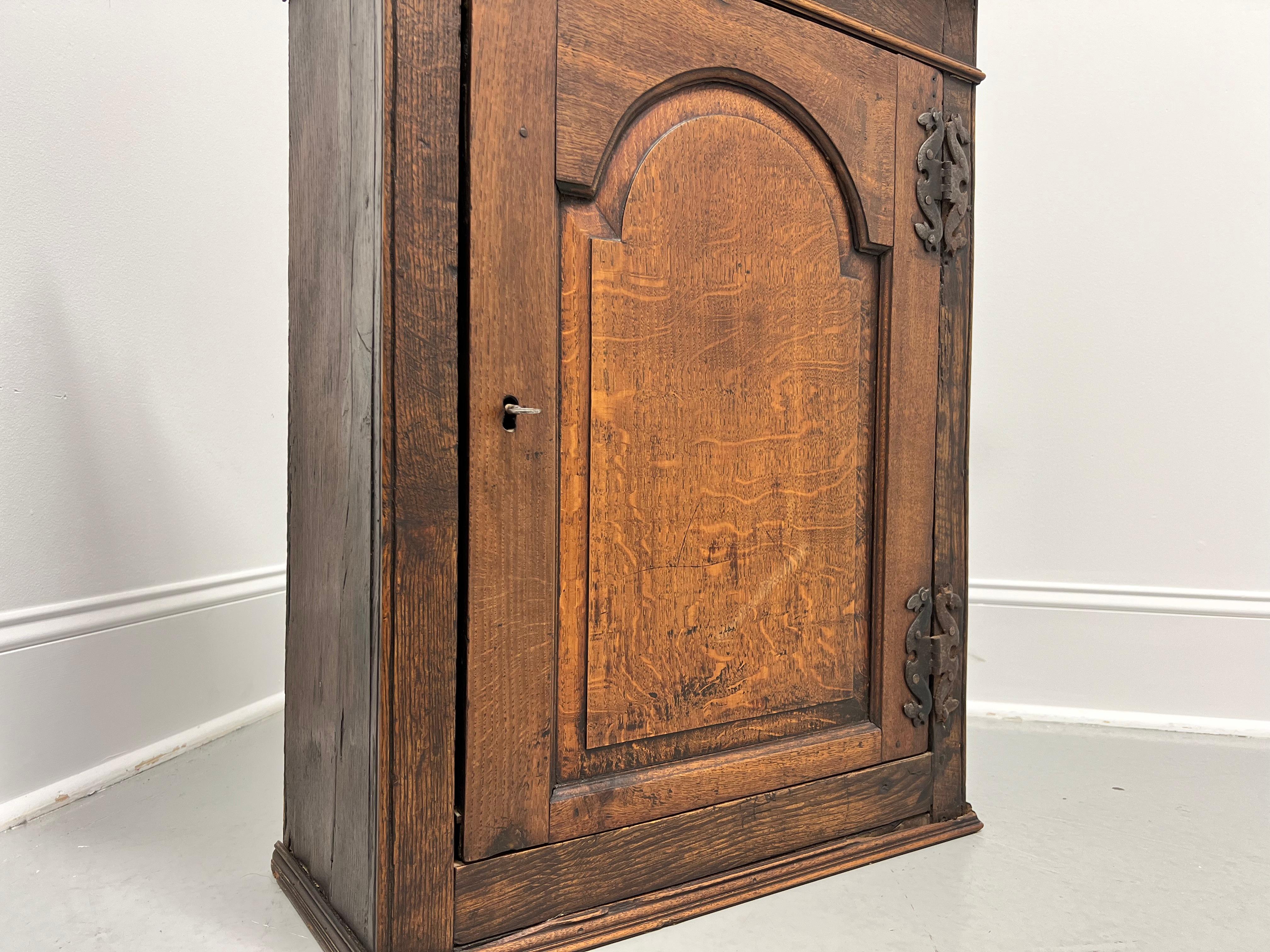 Circa 1700 Quartersawn Oak English Hanging Cupboard with Tombstone Panel Door For Sale 2