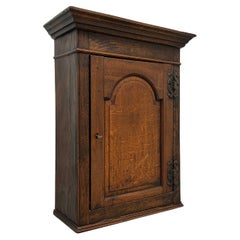 Antique Circa 1700 Quartersawn Oak English Hanging Cupboard with Tombstone Panel Door