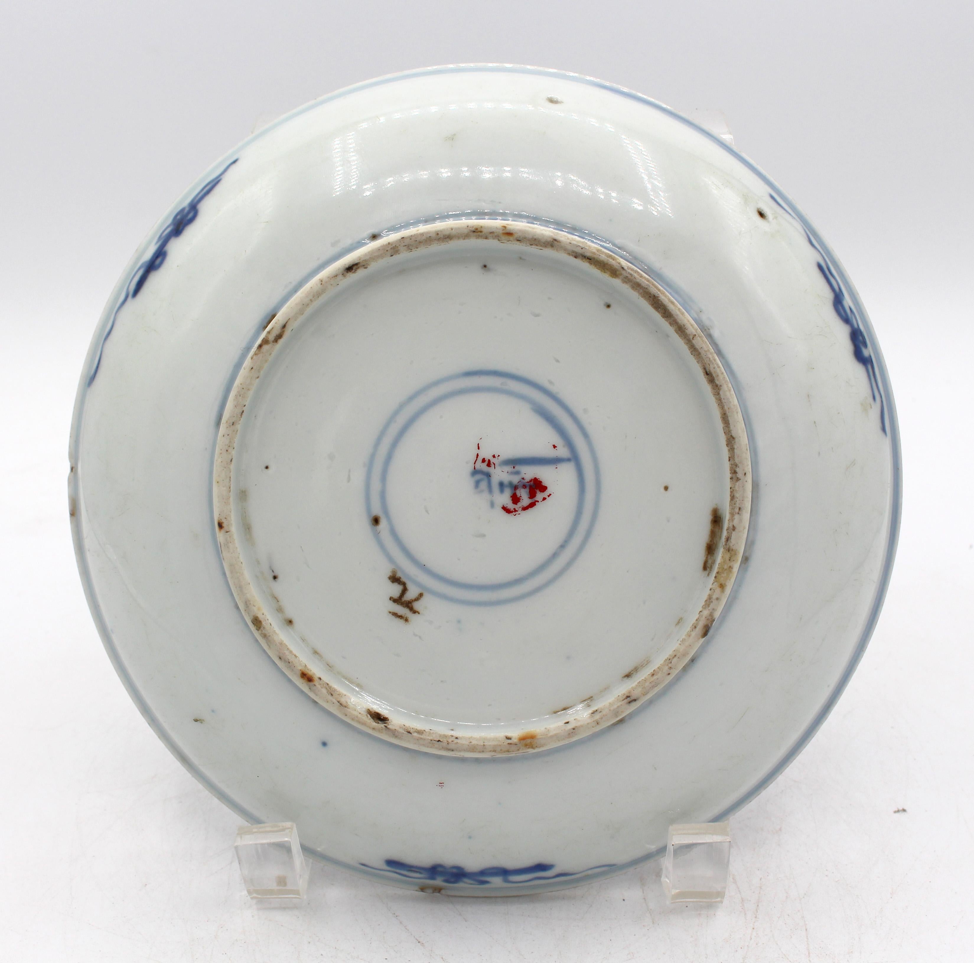 Circa 1736-1795 or earlier Dehua kiln blue & white porcelain dish, Chinese. Underglaze painting of dragons or phoenix birds on cavetto & scroll border. Experts differ between late Ming to Qing dynasty. The owner's character has been scratched & dyed