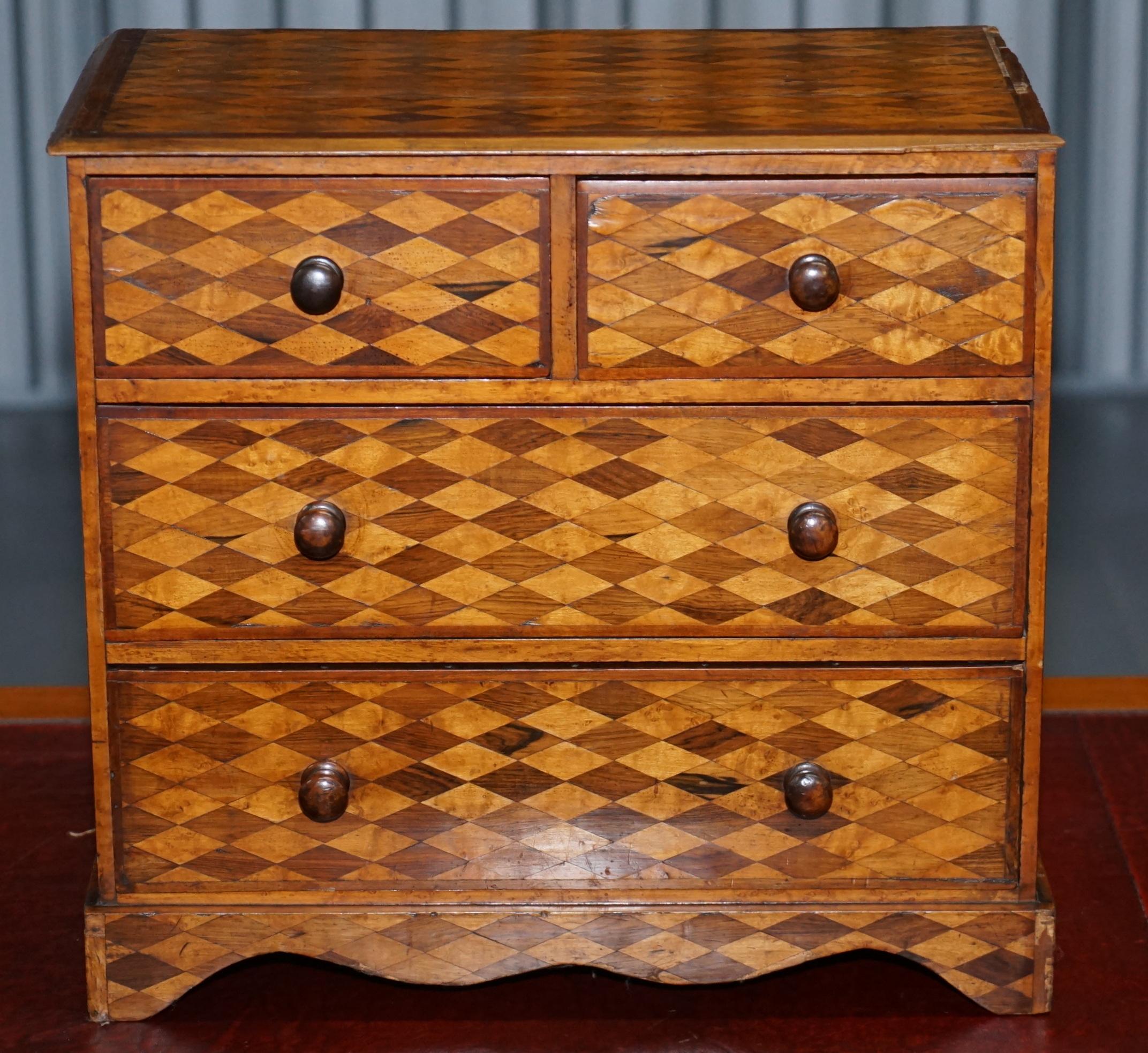 We are delighted to offer for sale this stunning and very rare circa 1750 salesman sample chest of drawers with satinwood and mahogany parquetry inlaid specimen wood 

A very rare and collectable decorative little chest of drawers, over 270 years