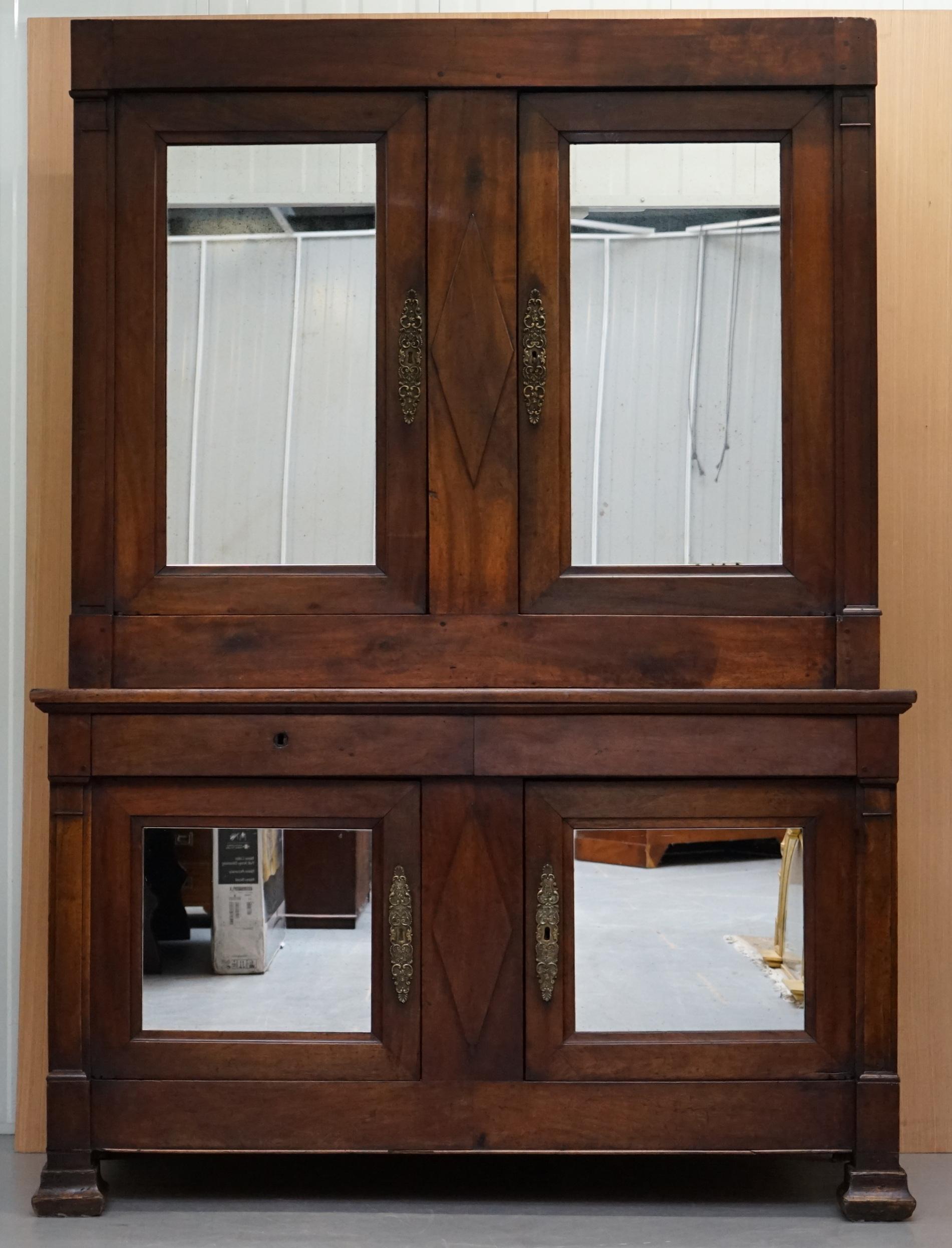 We are delighted to offer for sale this stunning monumental 18th century solid hand carved wood house keeper’s cupboard with panelled mirrors all-over

This really is a substantial piece of furniture, its handcut from huge slabs of solid timber,