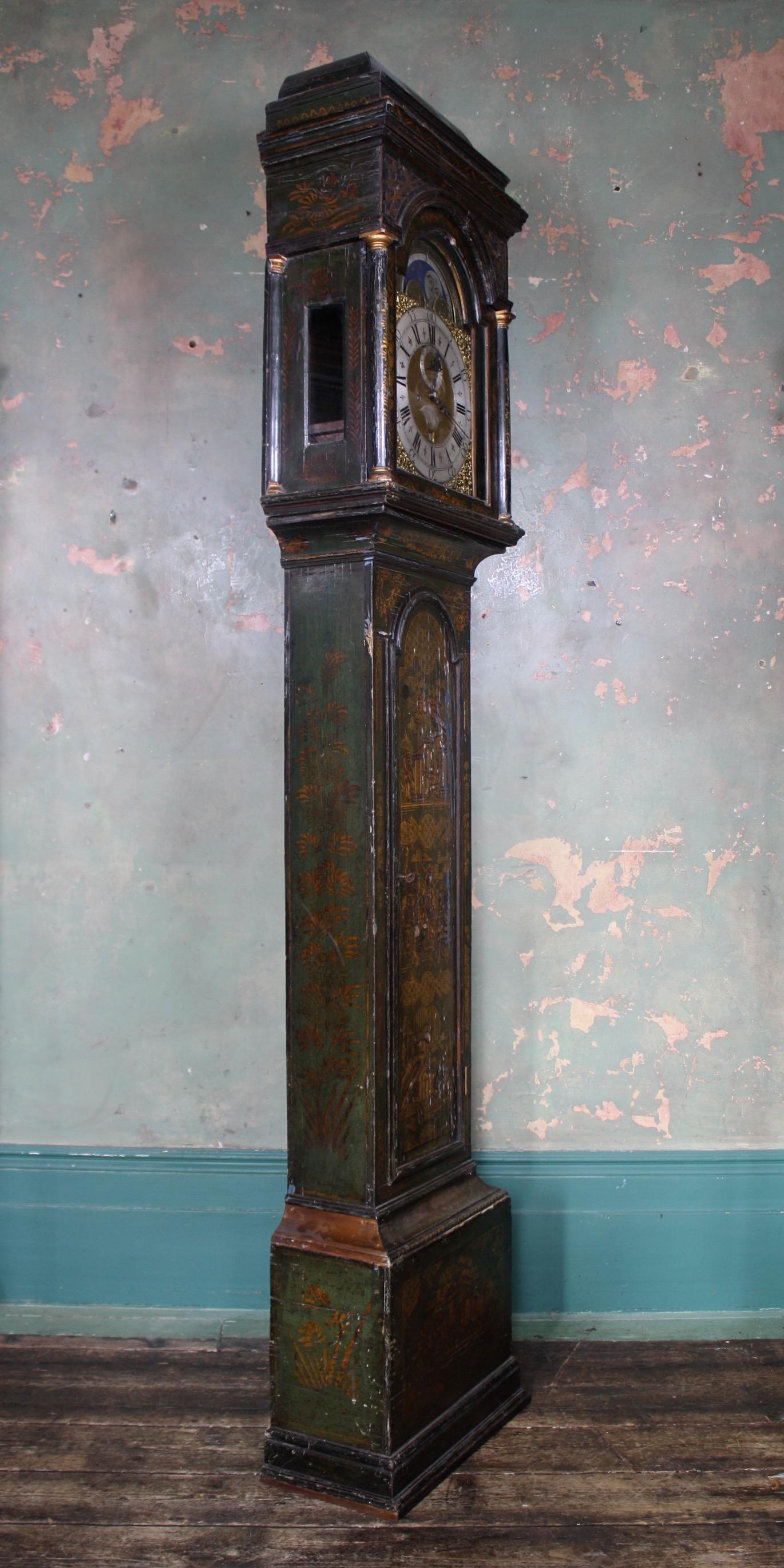 A fine circa 1740 clock by Thomas Haley of North Walsham, an eight day chinoiserie decorated long case clock, the moon faced dial with subsidiary second and date dial, Roman numerals, the green painted chinoiserie and brass inlaid case with