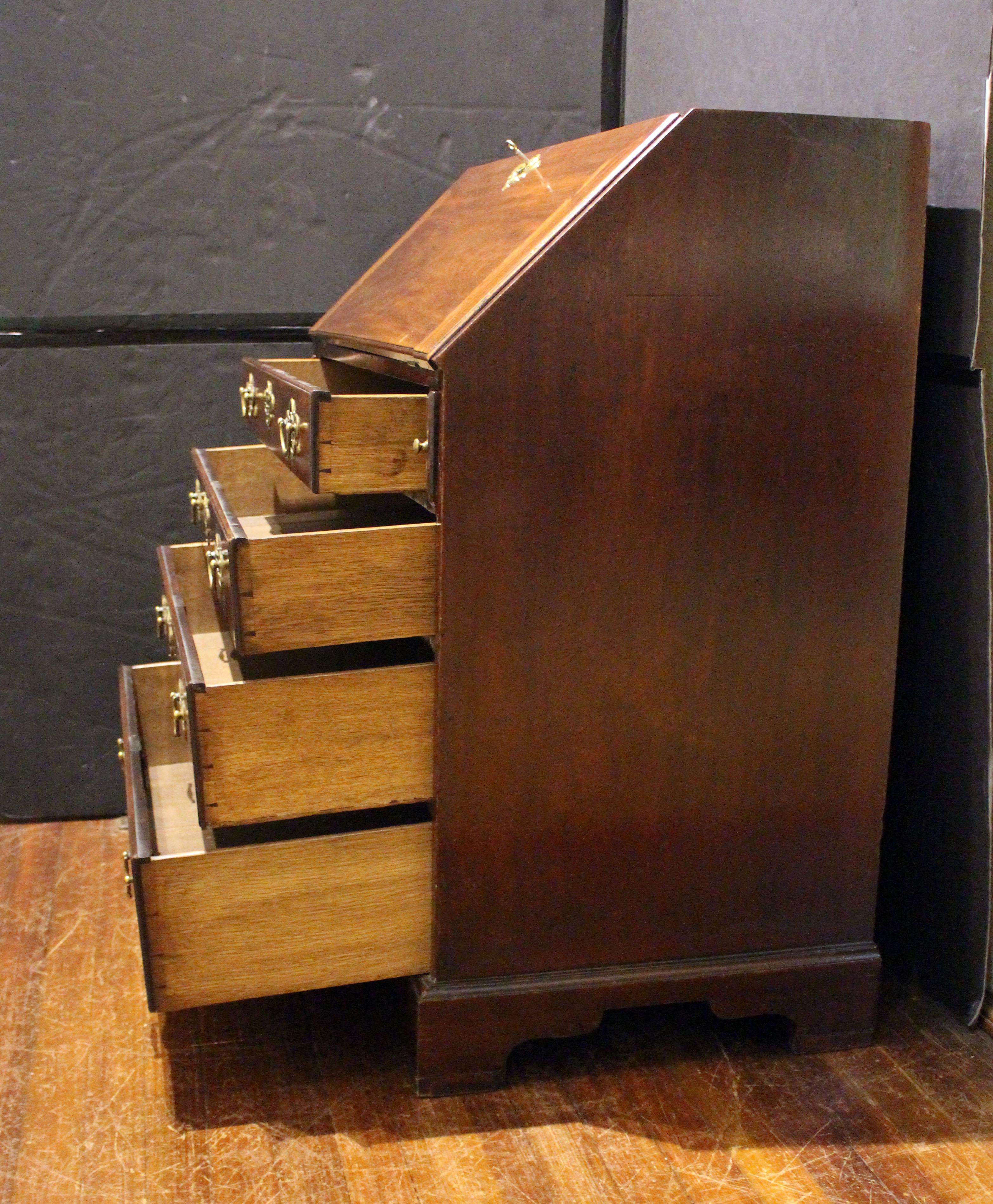 Circa 1750 early George III period slant front bureau desk. Wood referred to at the time as 